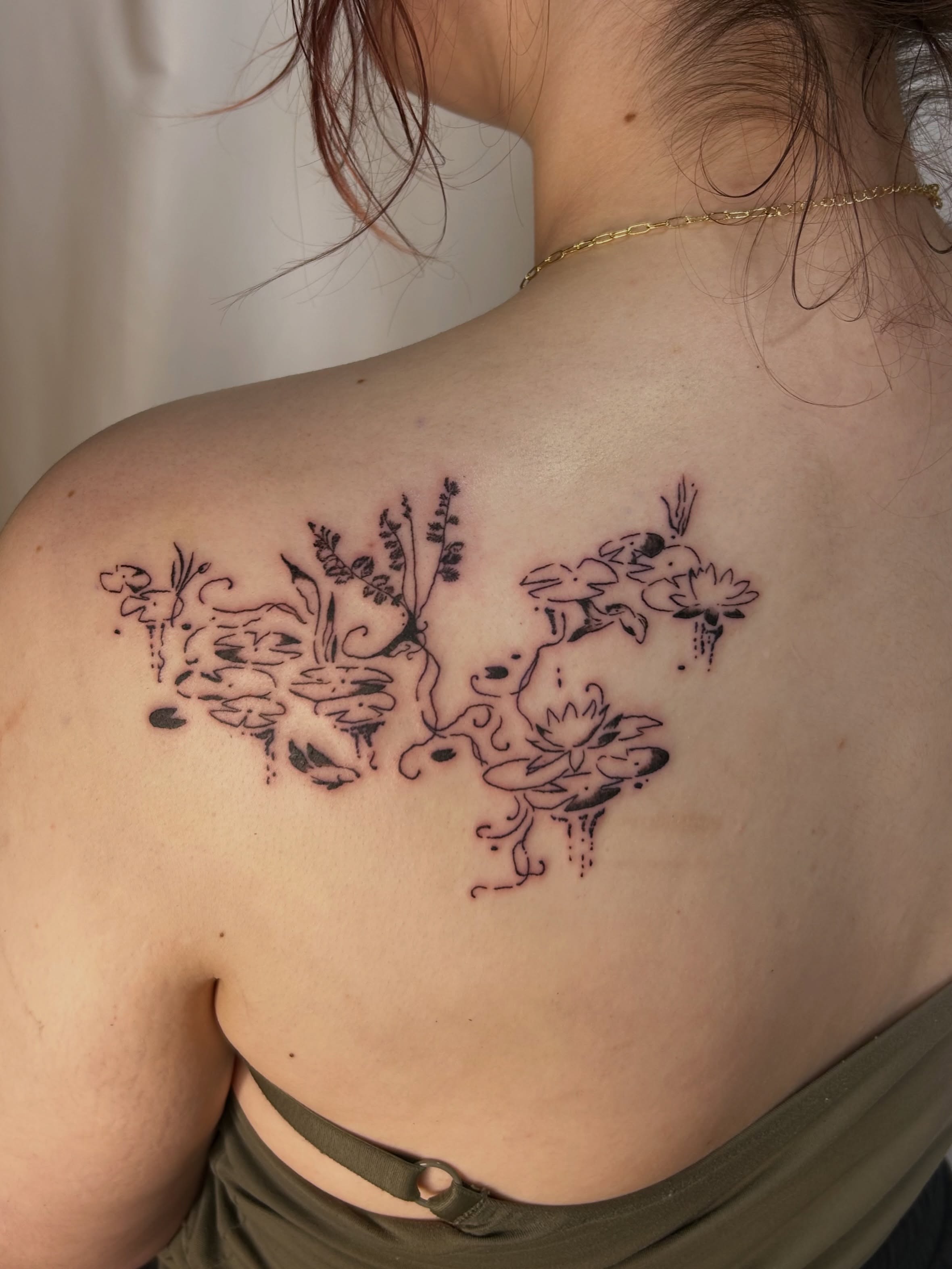 Floral arrangement dotwork tattoo on the shoulder by wanderfernfairy
