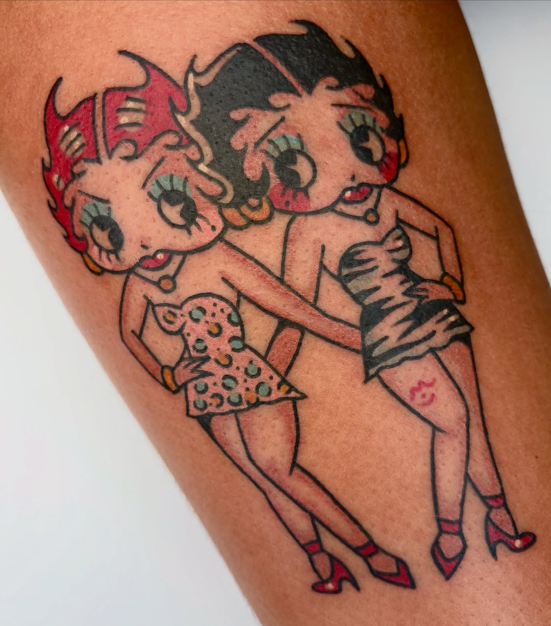Betty Boop and friend American traditional tattoo on the thigh by Bella