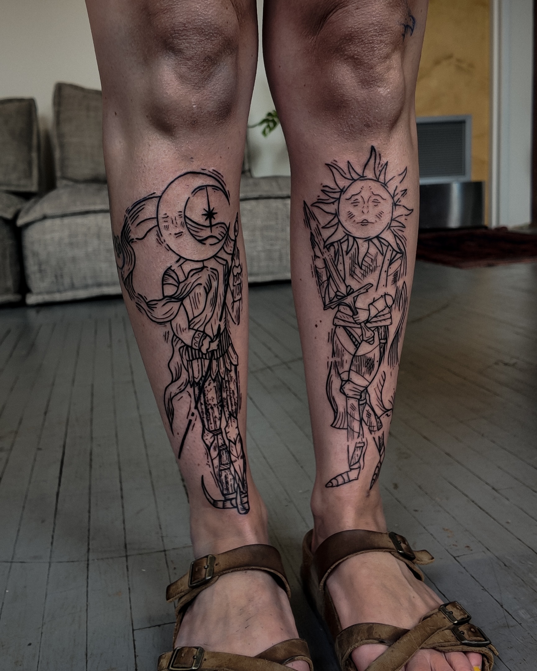 Astronaut and sun black and grey tattoo on the calf by Morgan Diann