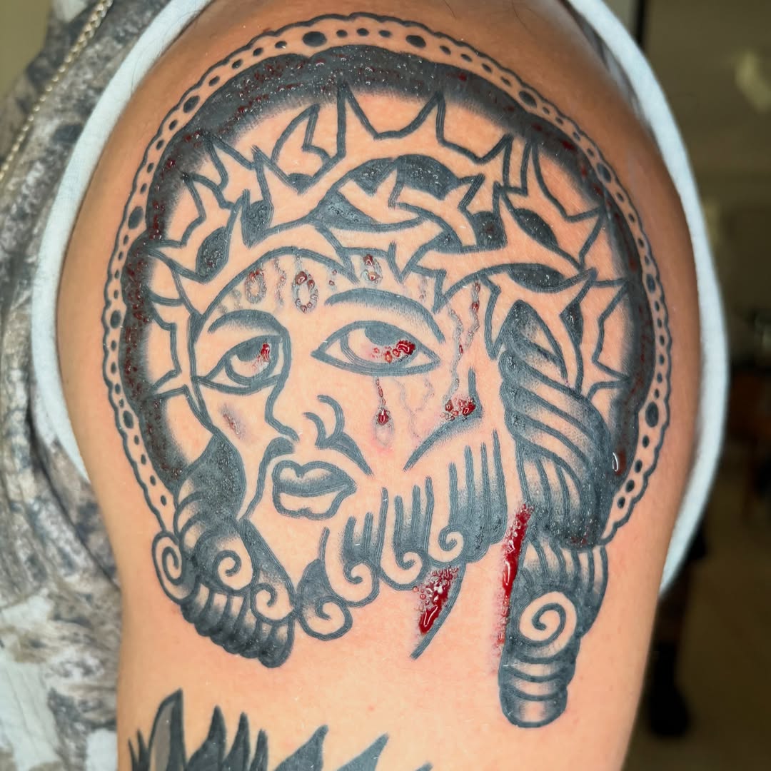 God-like face neo-traditional tattoo on the shoulder by Braedon 🎱
