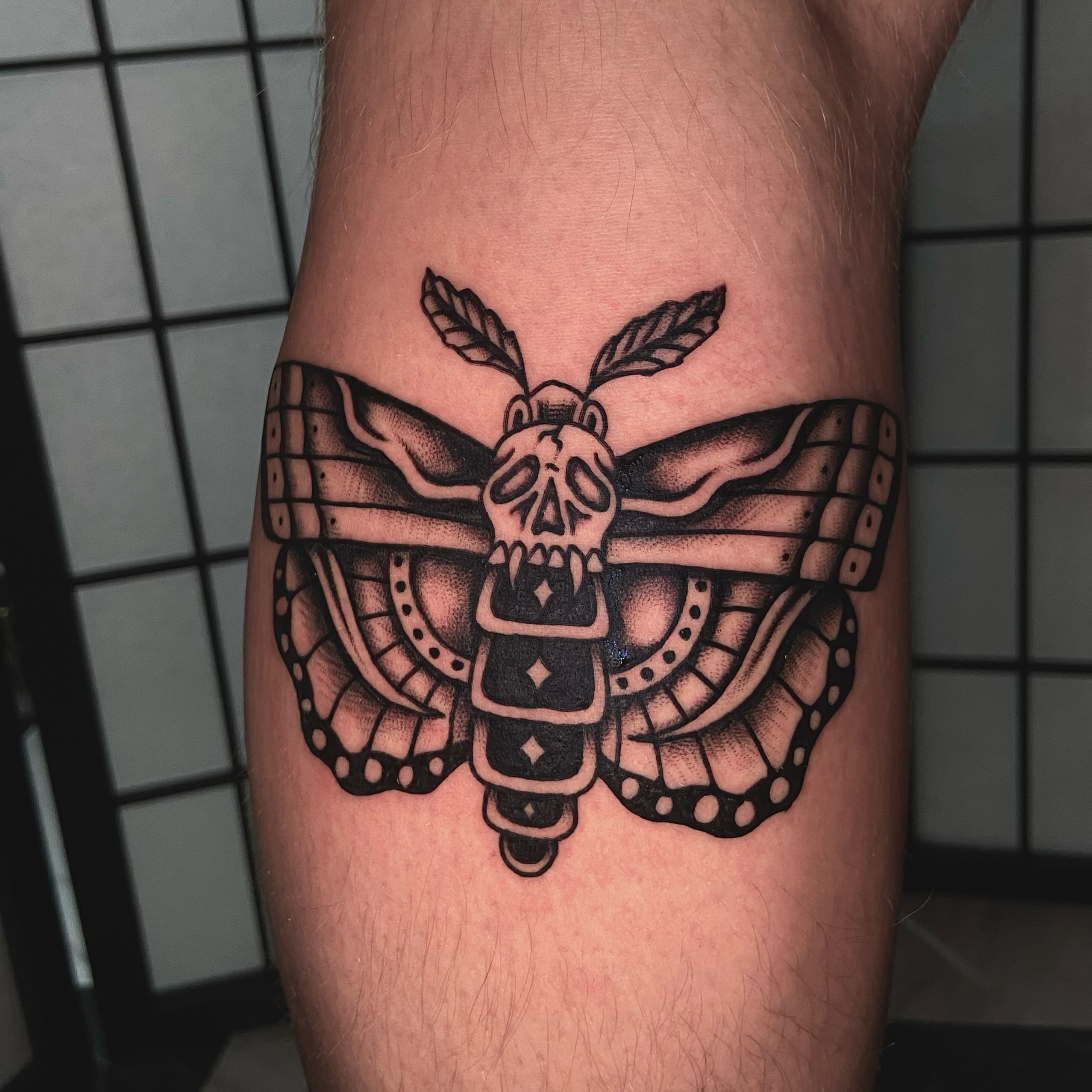 Skull moth geometric tattoo on the forearm by R y a n S m i t h