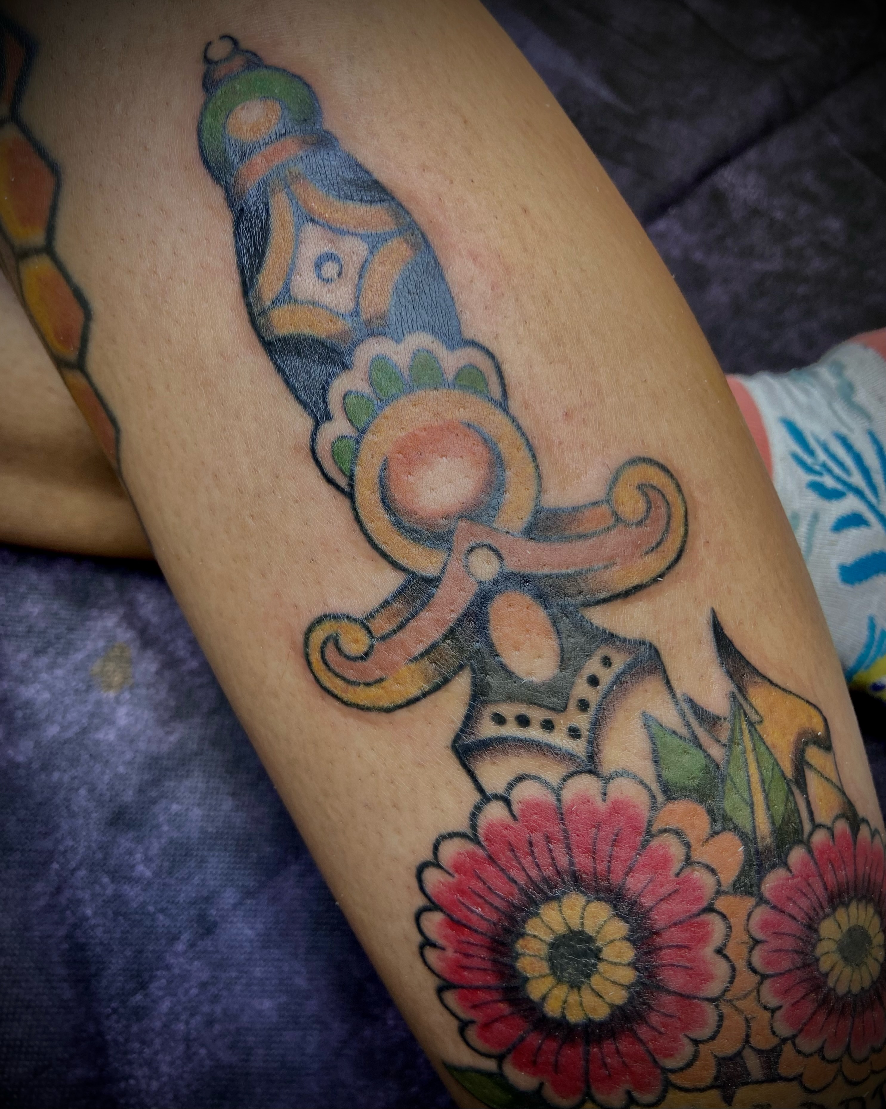 Sword and flowers American traditional tattoo on the leg by Shelbie, Salt Lake City, Utah