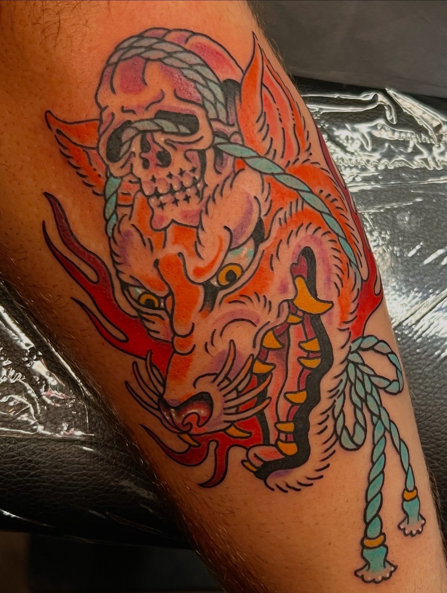 Demon skull American traditional tattoo on the forearm by Andrea Patterson