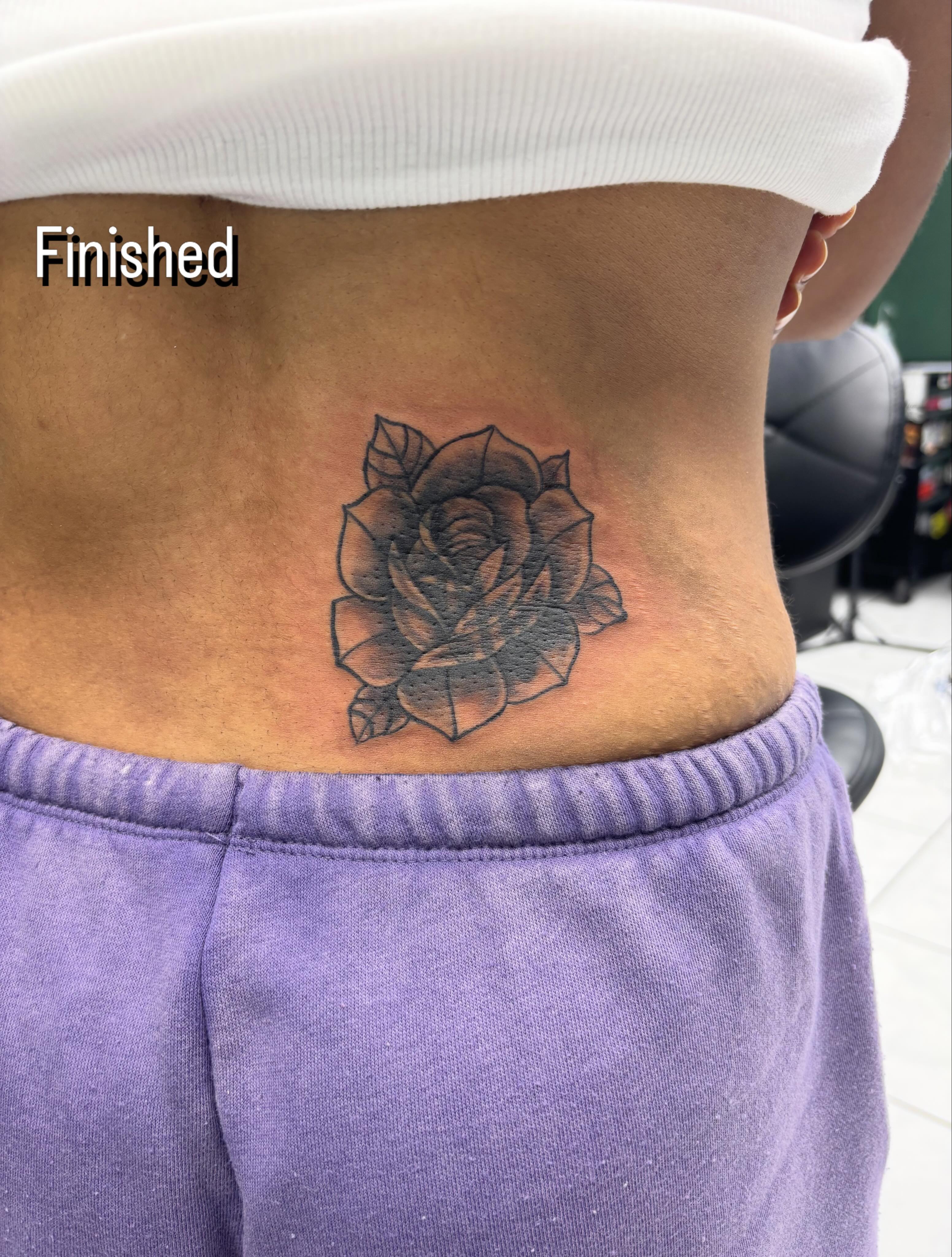 Rose black and grey tattoo on the back by Shadows Tattoos
