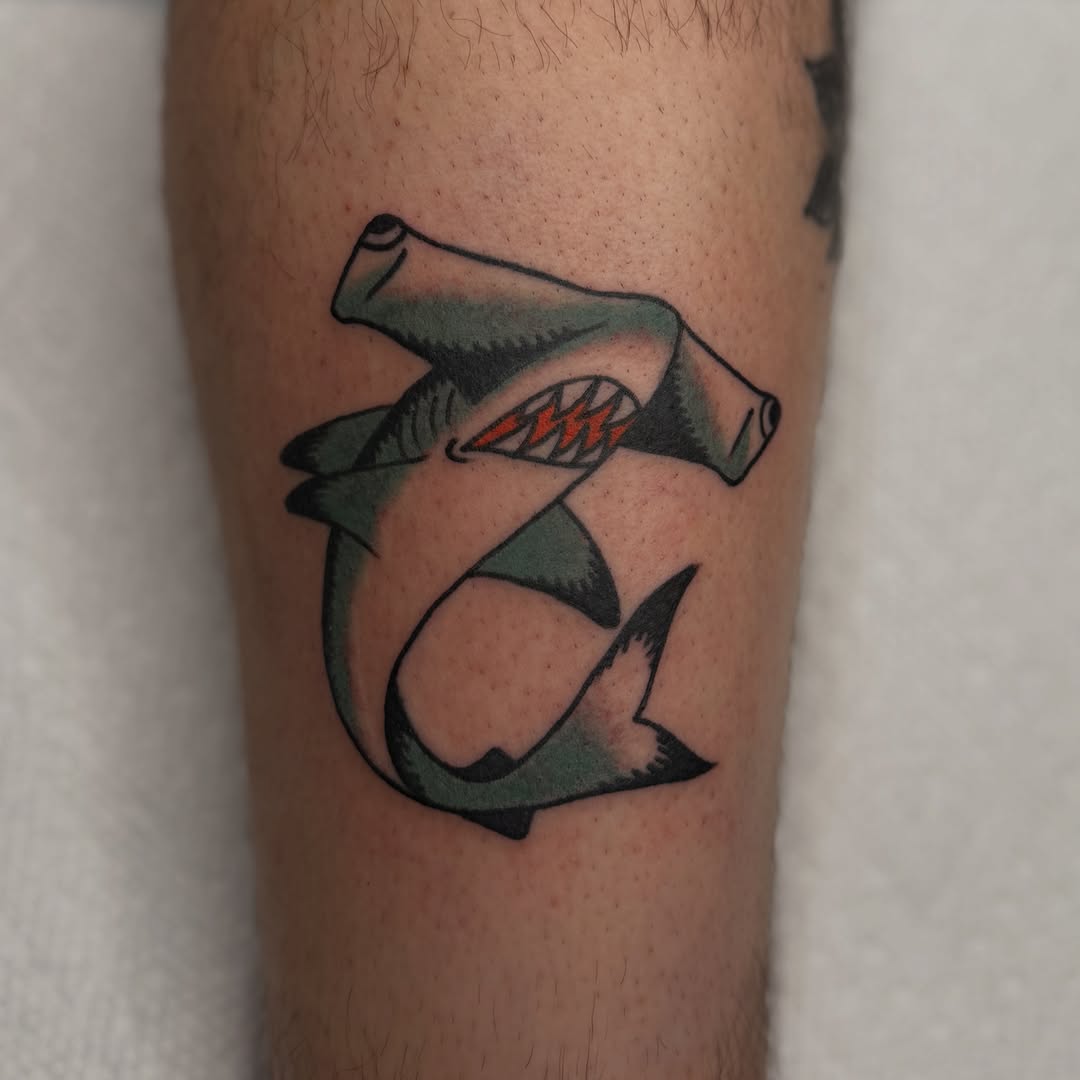 Shark American traditional tattoo on the forearm by Andrew Storm