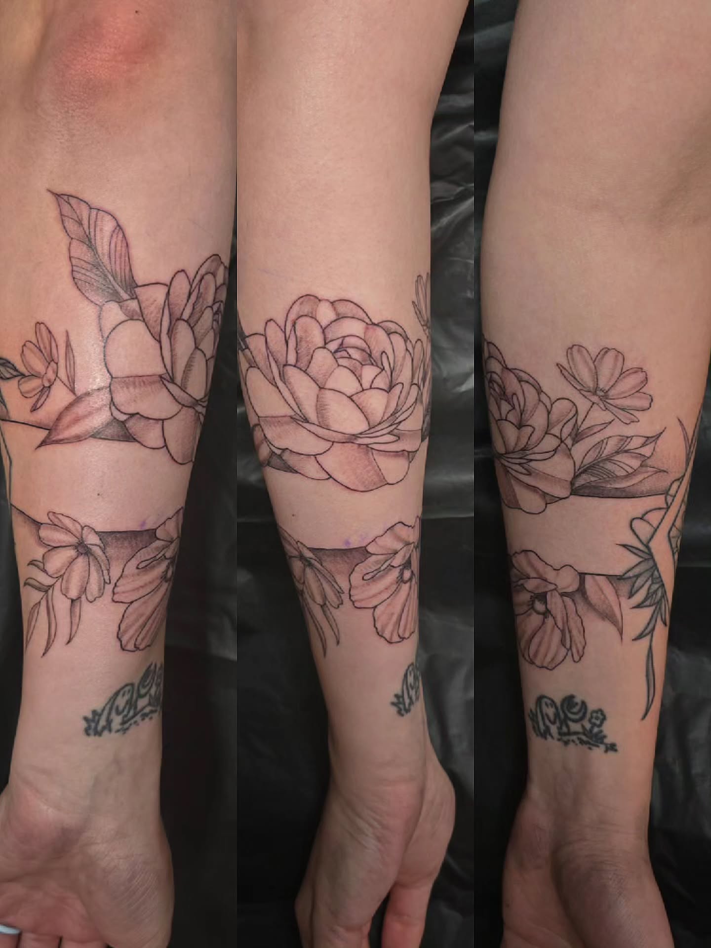 Floral arrangement black and grey tattoo on the forearm by Linda Marroum, Morningside, Maryland