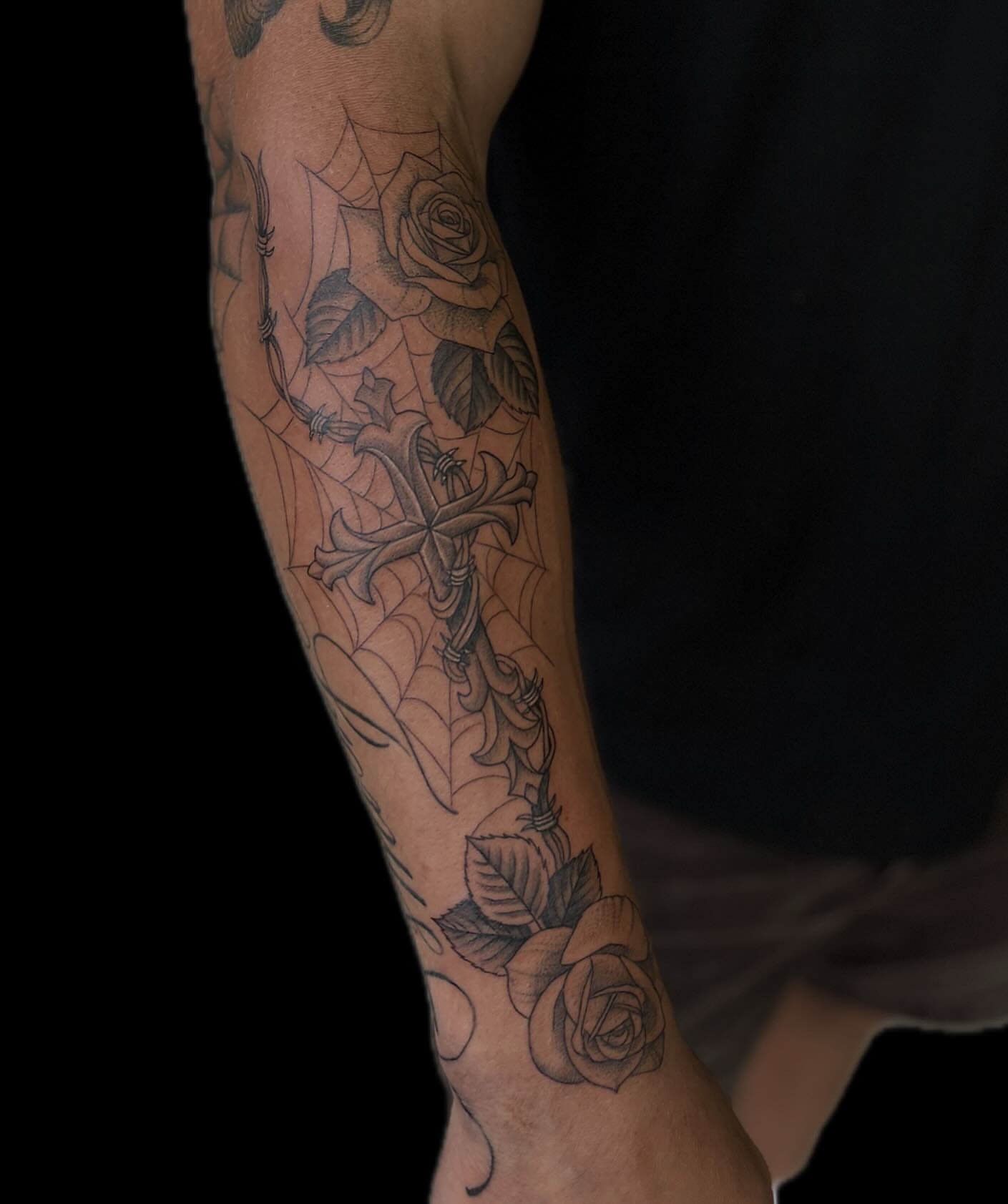 Cross and roses black and grey tattoo on the forearm by 🖤Sabrina Ryan🖤