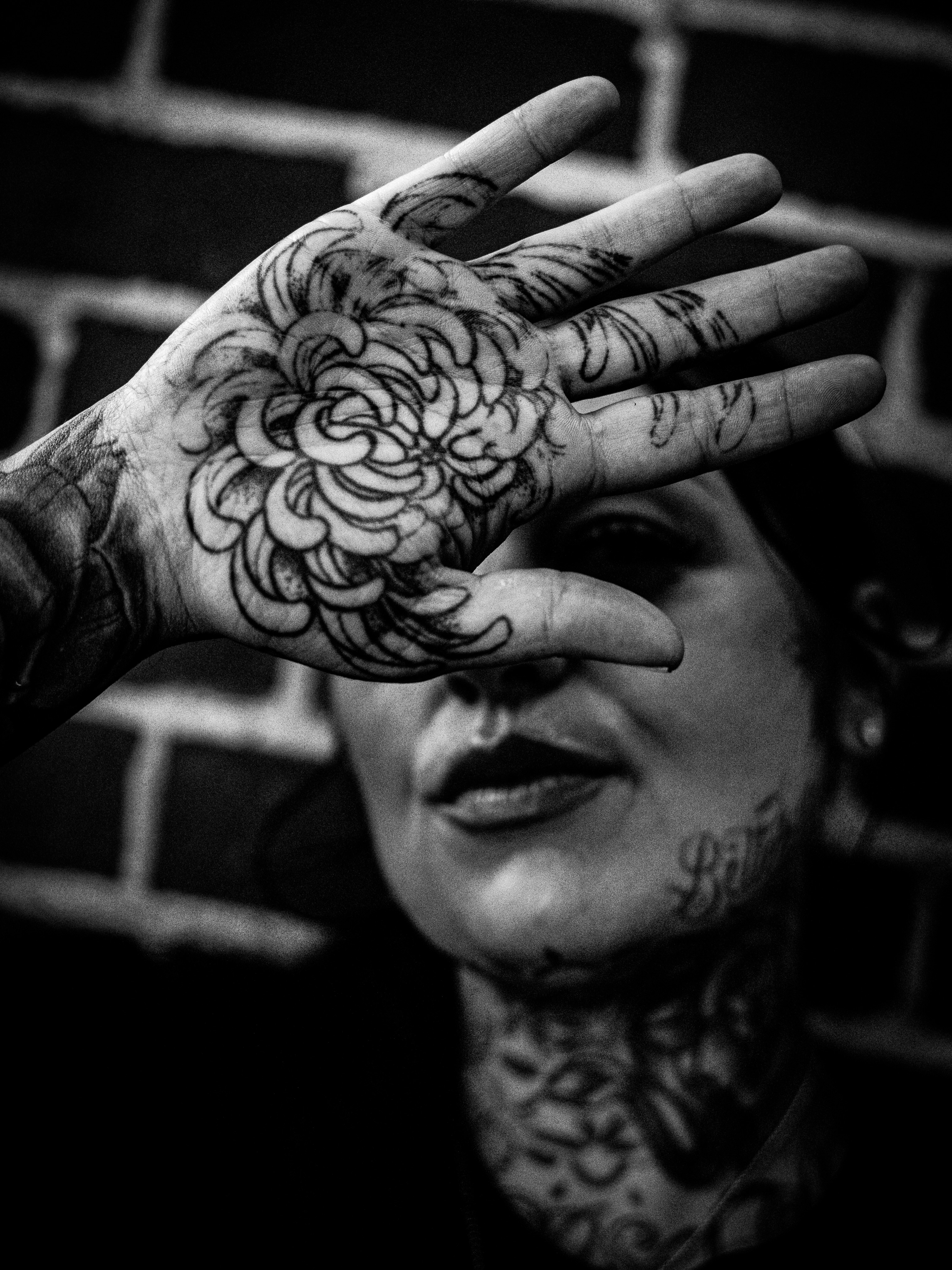 Floral design black and grey tattoo on the hand by Angel Pineda-Rodriguez