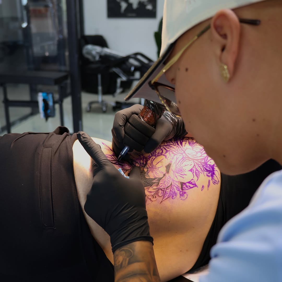 Floral design new school tattoo on the shoulder by Damon Valdez