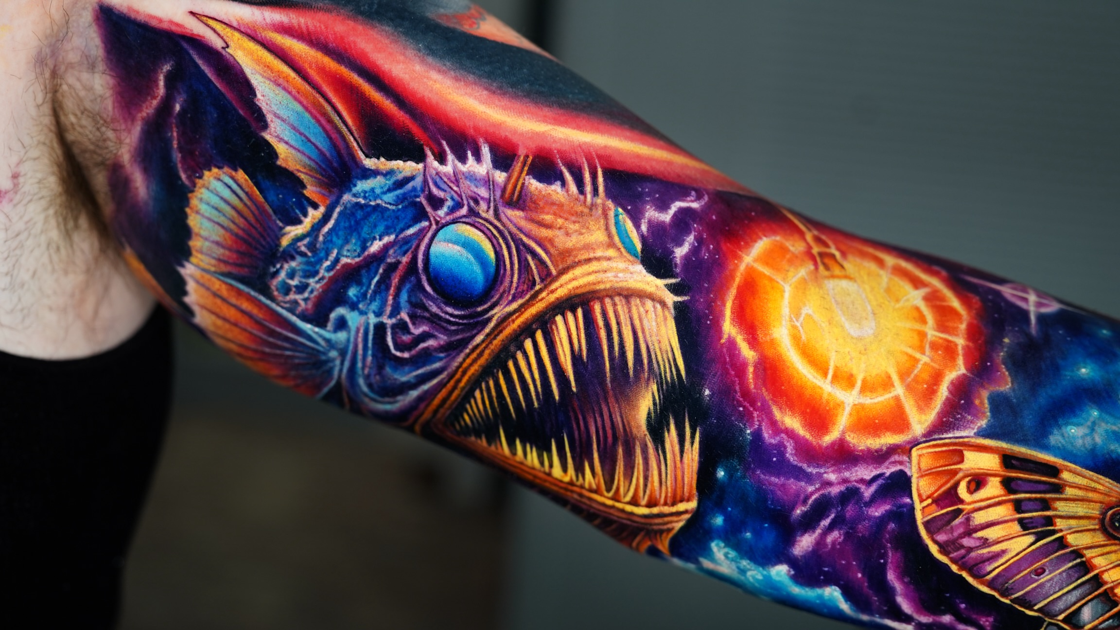 Anglerfish realism tattoo on the forearm by Jesser Escobar - Tattoo Artist