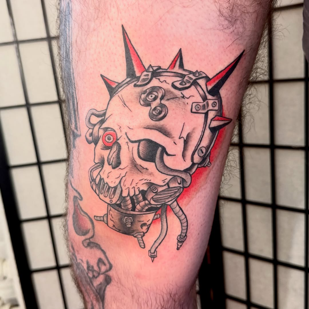 Cyborg skull neo-traditional tattoo on the forearm by Zac Smith-Chevalier