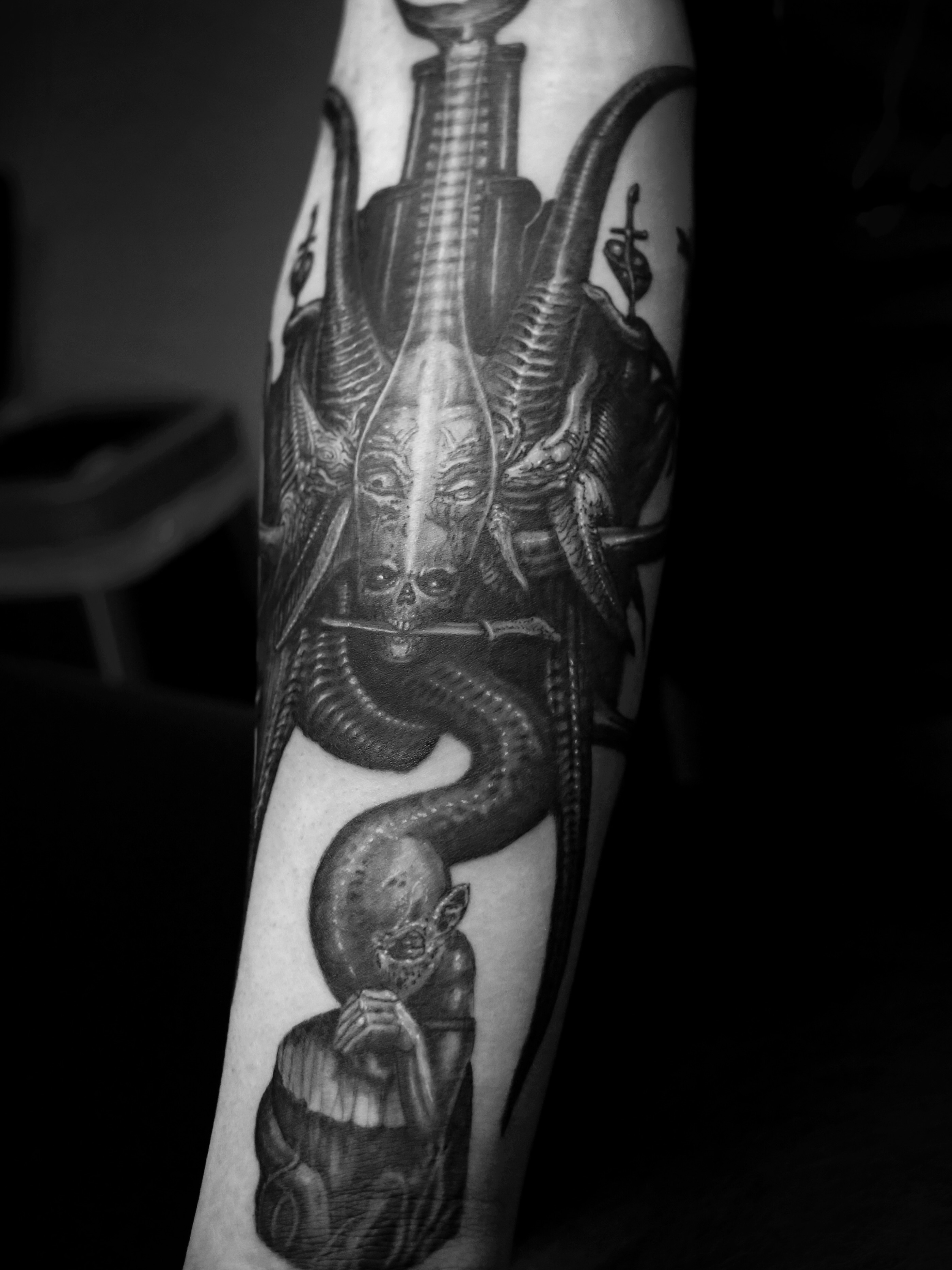 Tattoo by @dustinburtart — dark_realism, black_and_grey