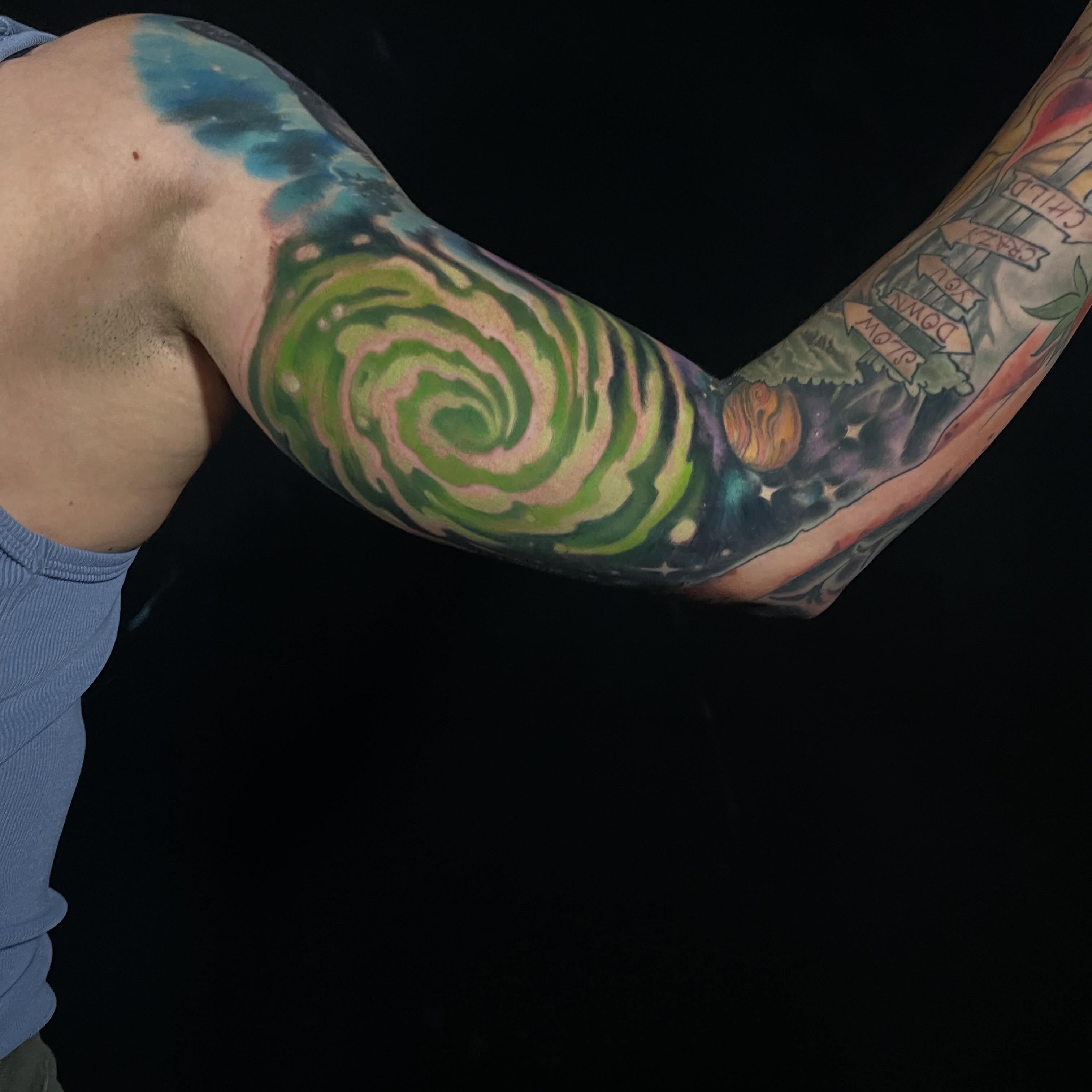 Swirling galaxy dotwork tattoo on the forearm by ✨𝕄𝕚𝕜𝕖 𝕆’𝔽𝕒𝕣𝕣𝕖𝕝𝕝✨, Denver, Colorado