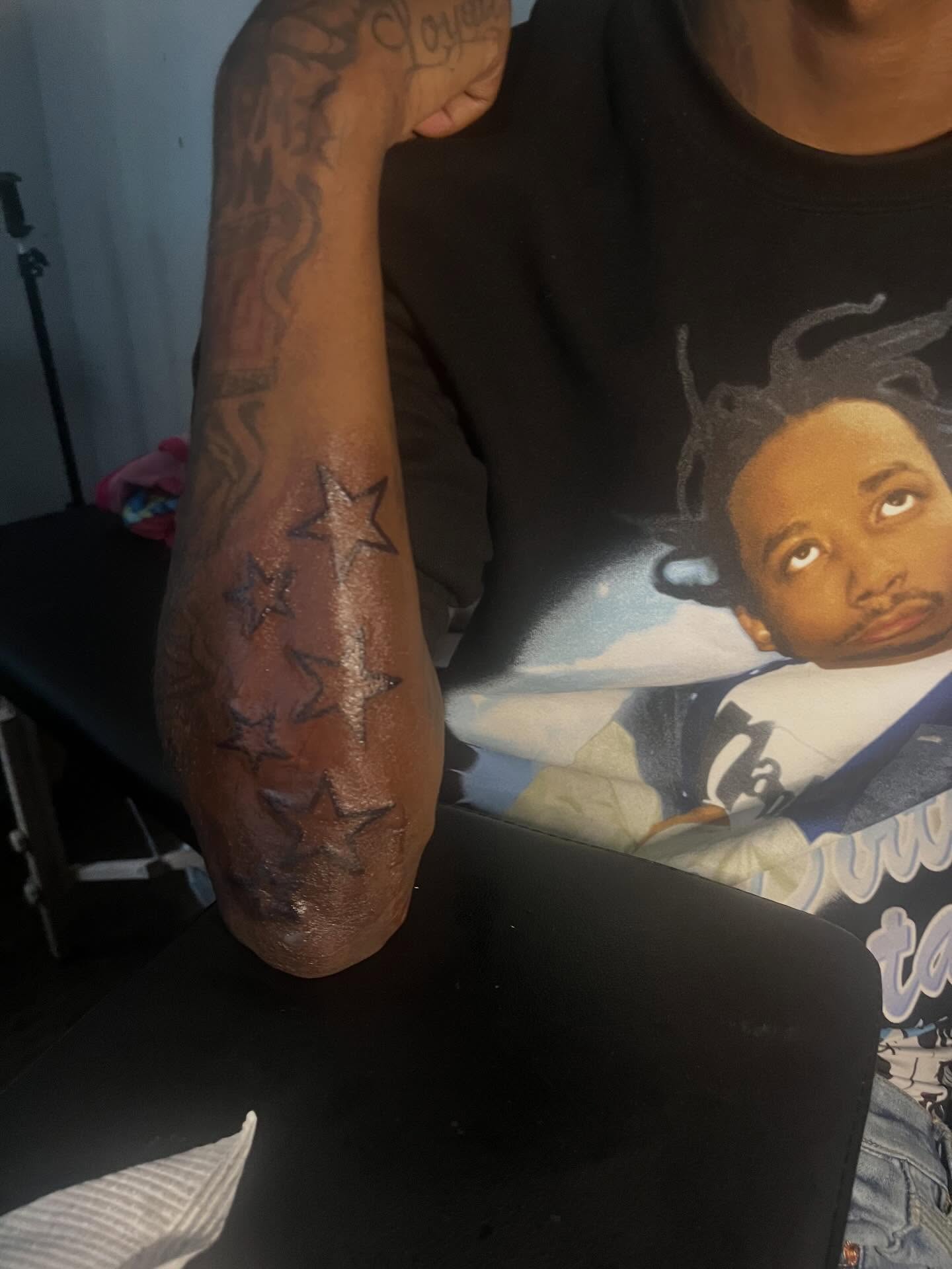 Stars black and grey tattoo on the forearm by π Westside