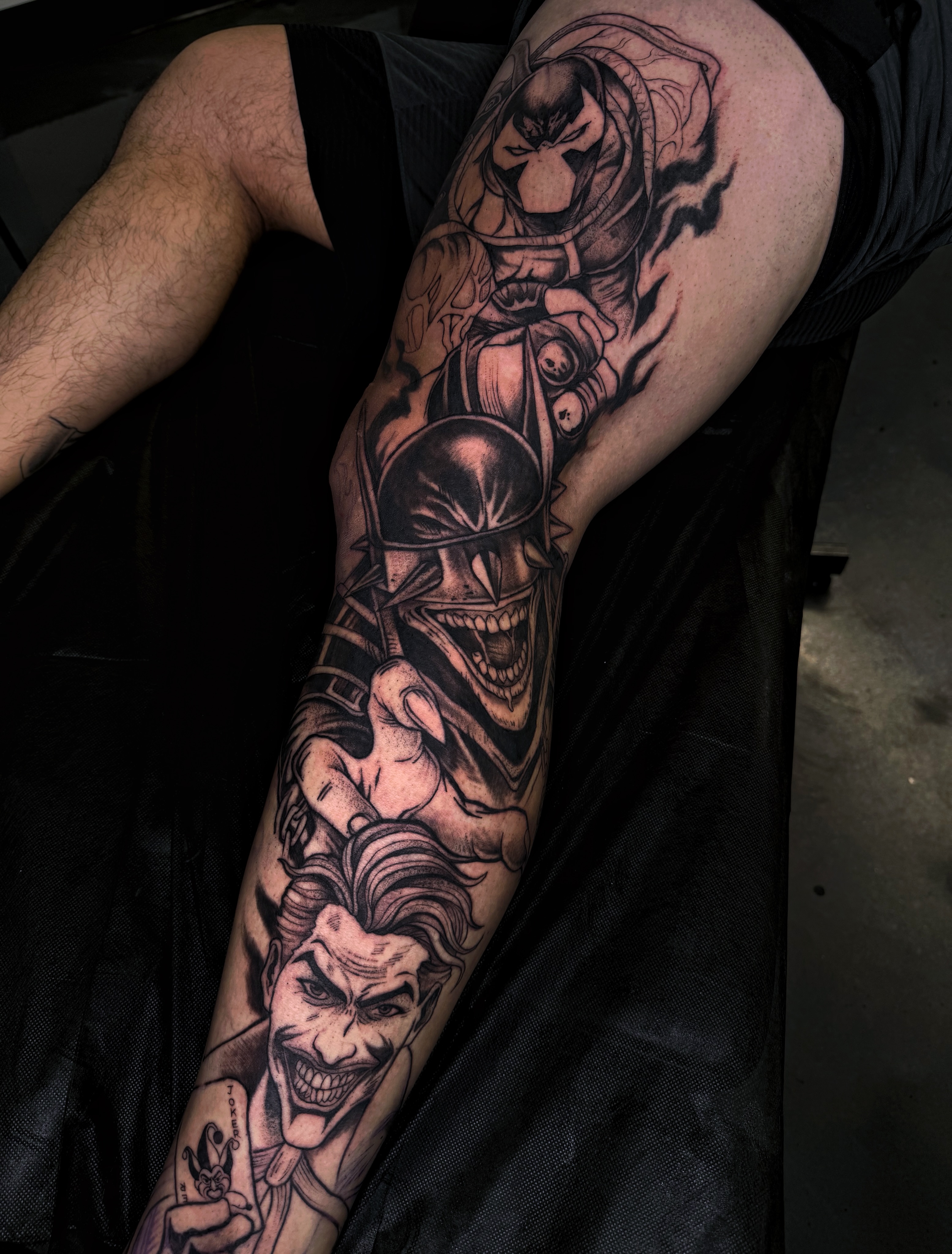 Joker character realism tattoo on the forearm by Melissa "Lotuss" Chan