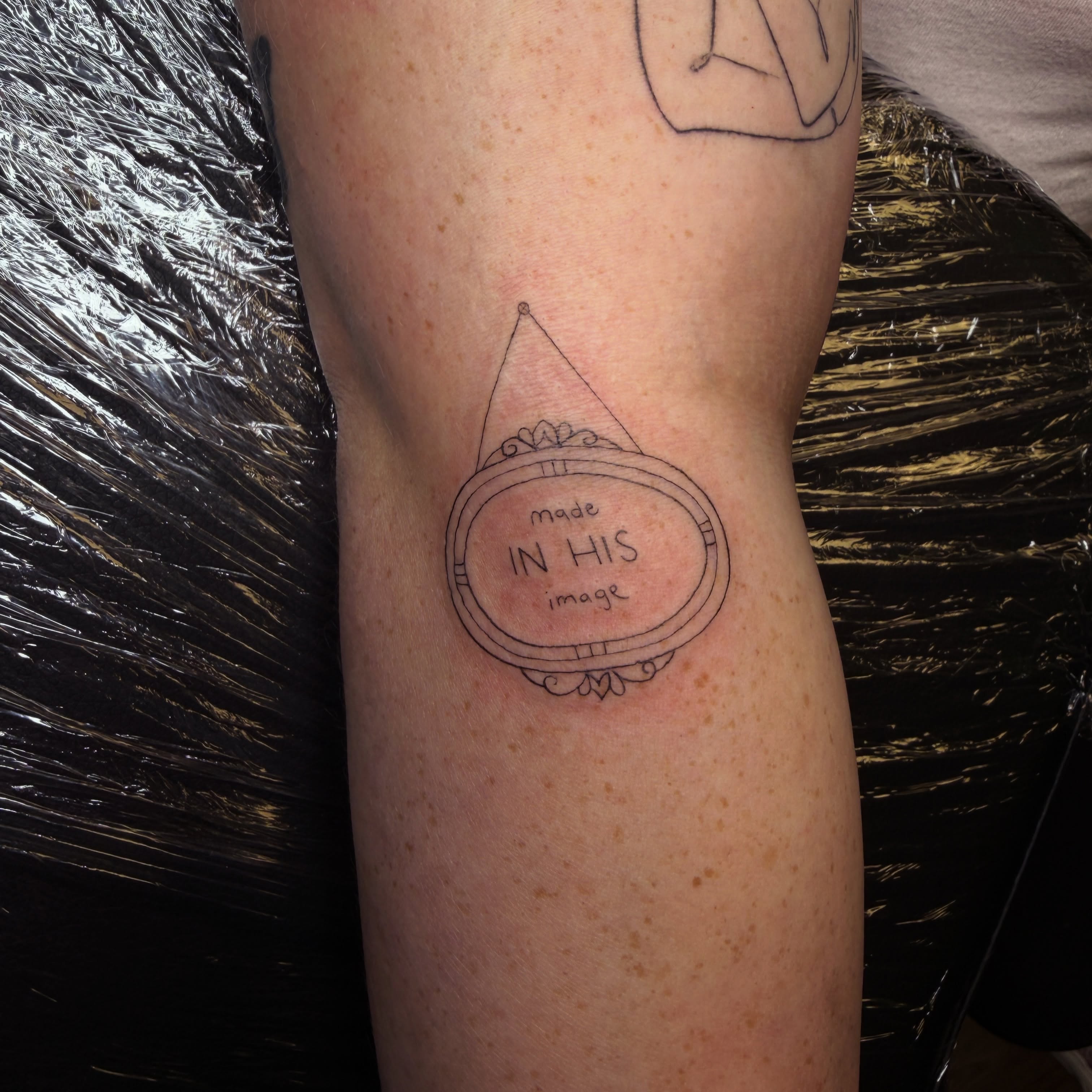 Mirror fine line tattoo on the forearm by Pretty Ugly Tattoos