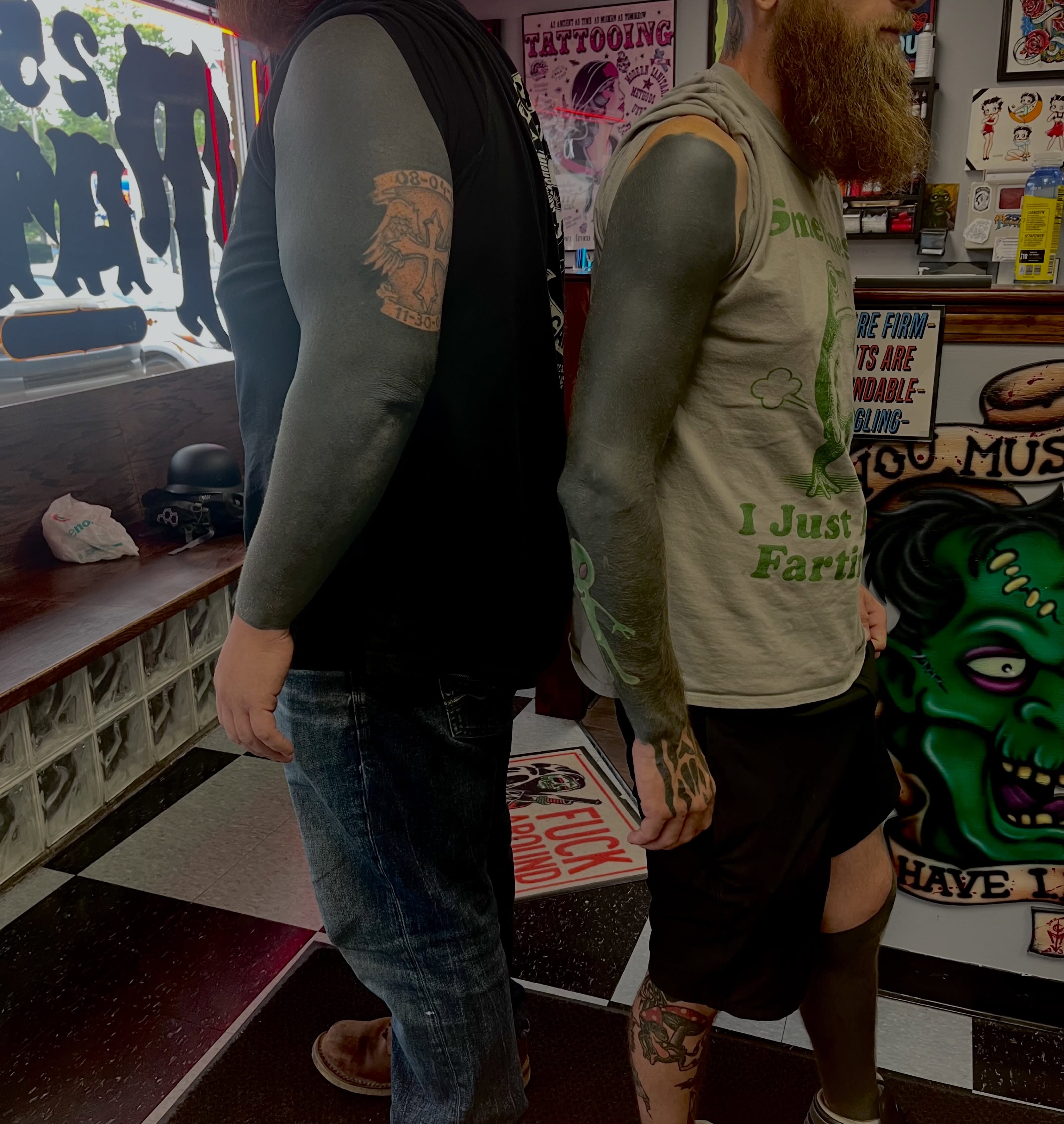 Cross American traditional tattoo on the upper arm by You’ll save me in your phone as Tattoo Tim