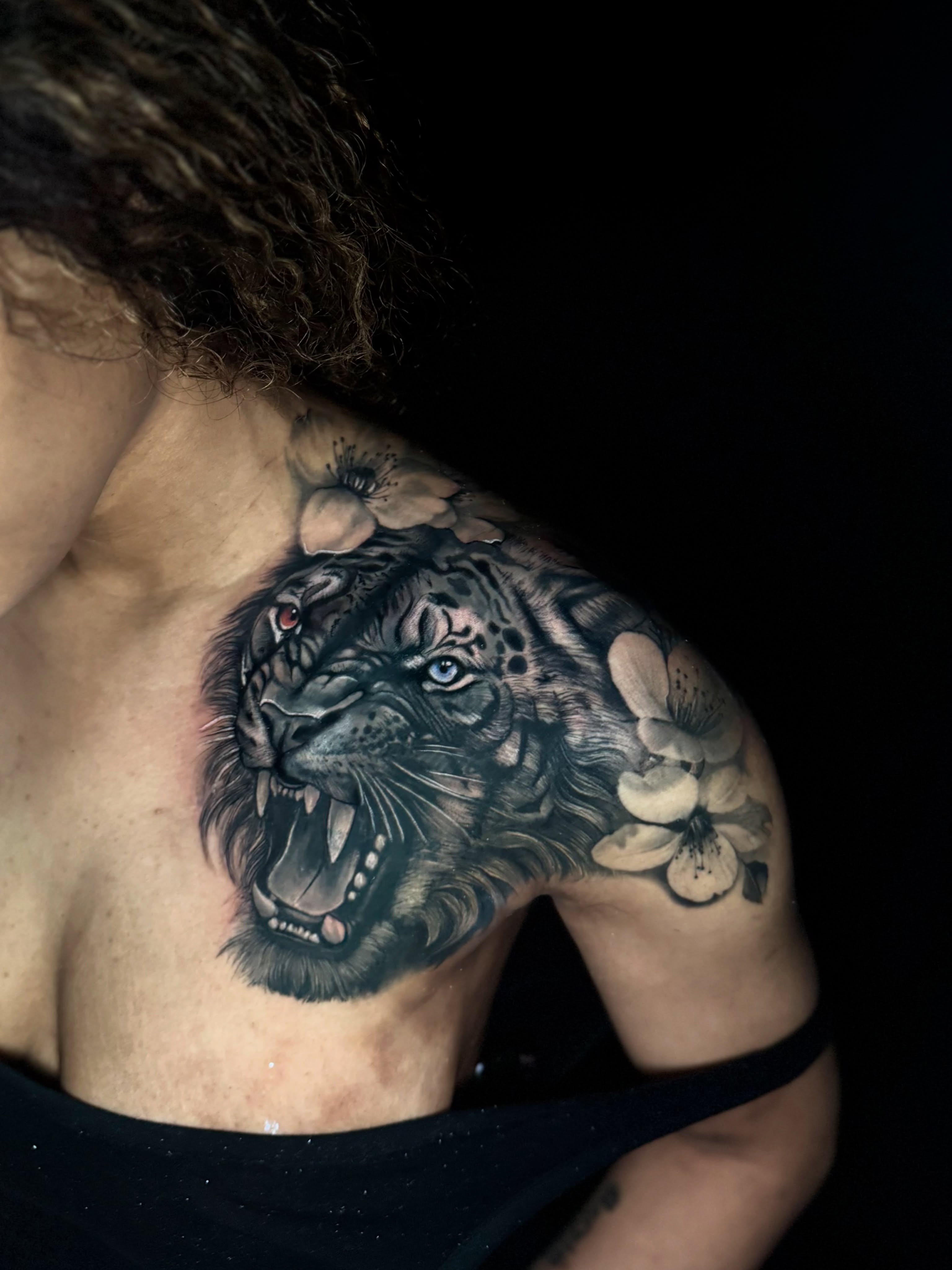 Lion head realism tattoo on the shoulder by Georgianna Ink, Las Vegas, Nevada