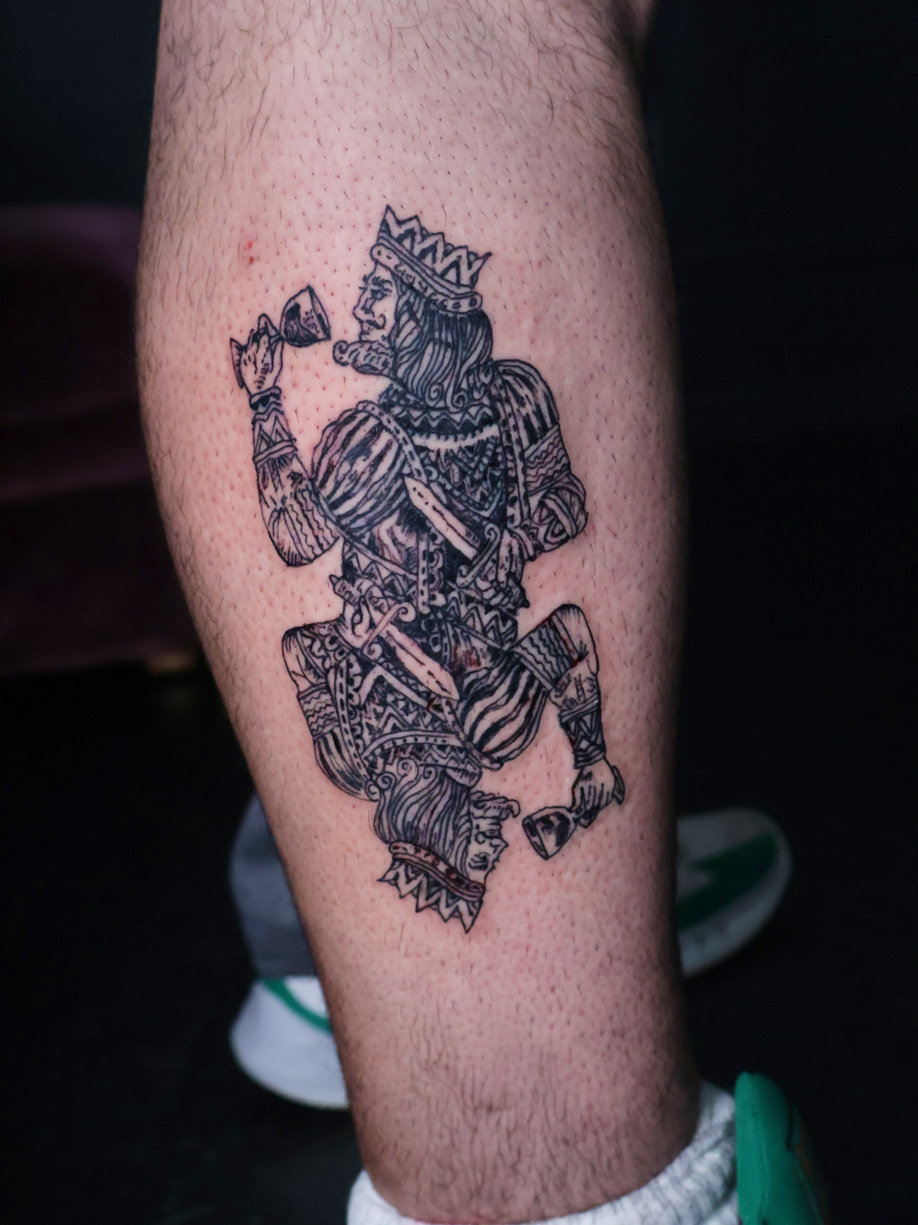 King playing chess American traditional tattoo on the leg by Denis Du Preez, East Williamsburg, Brooklyn