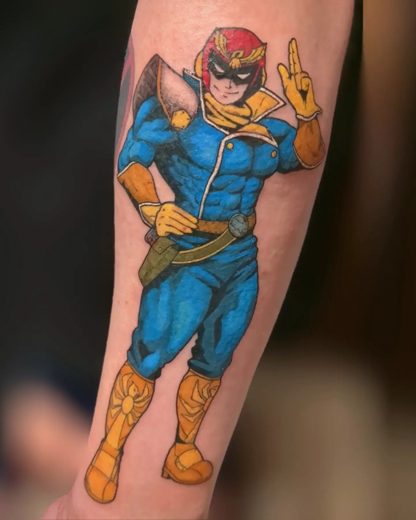 Superhero character American traditional tattoo on the forearm by Seth Chitwood
