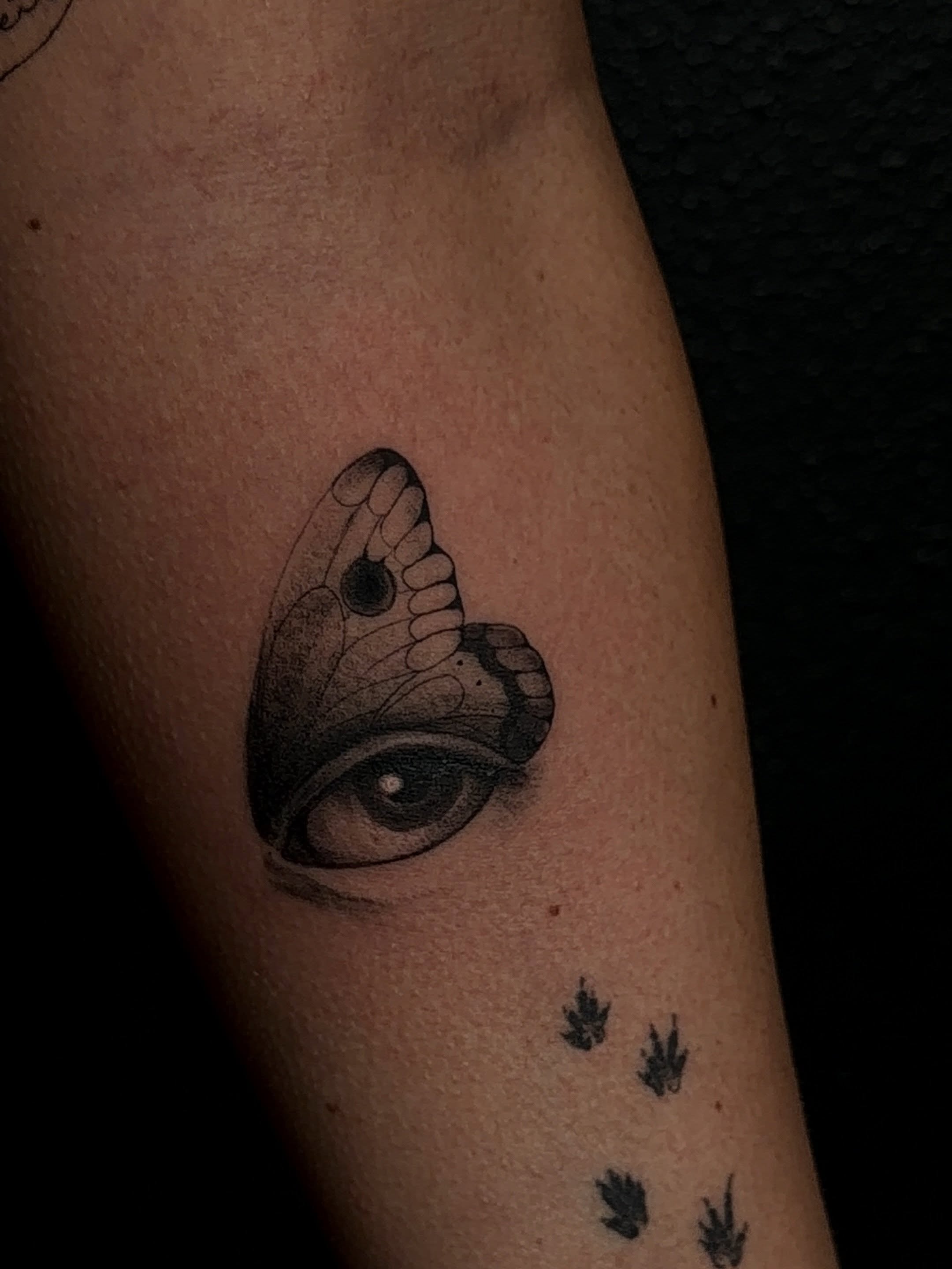 Eye and butterfly dotwork tattoo on the forearm by Jacksyn, Plano, Texas