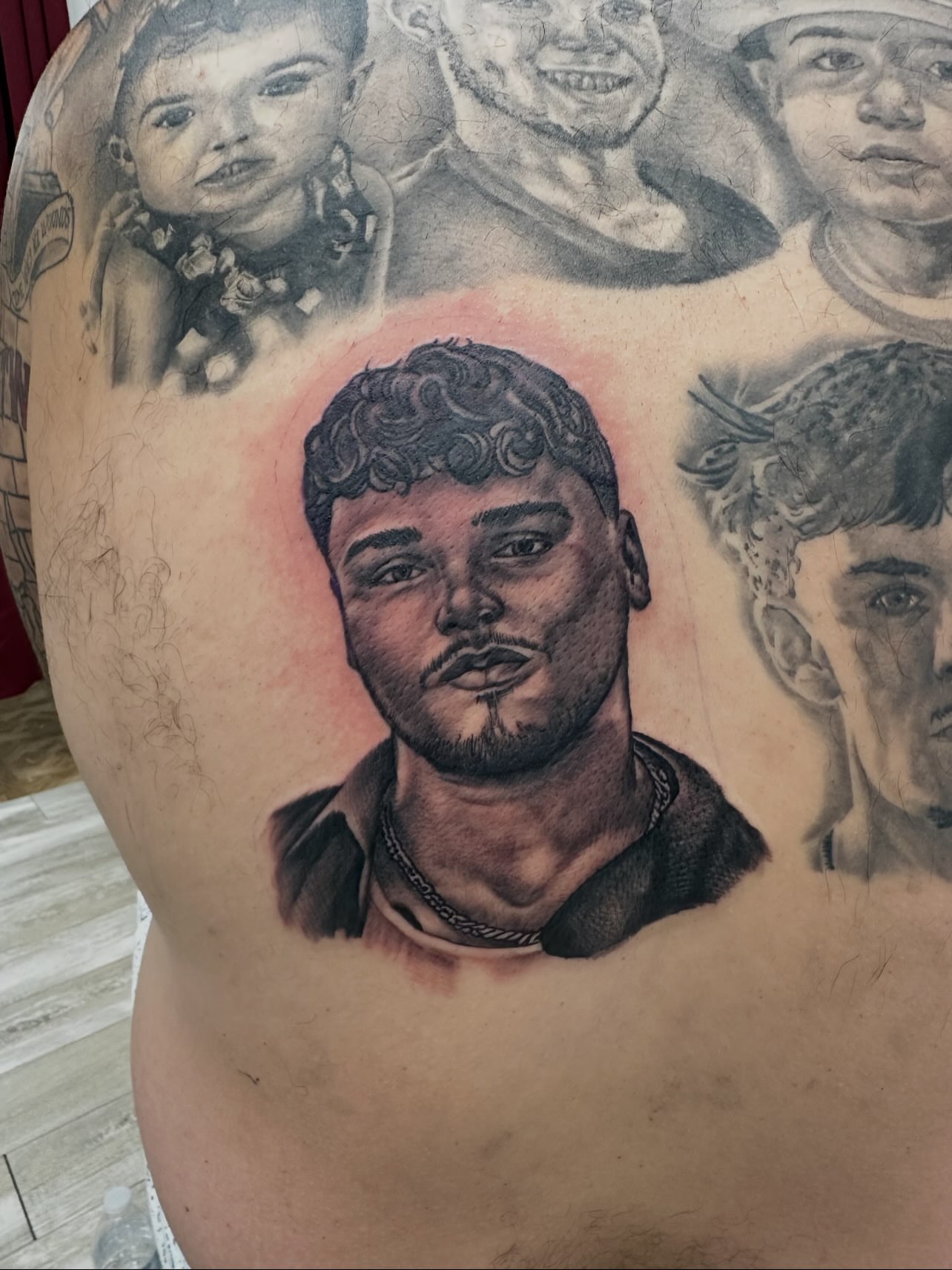 Portrait realism tattoo on the chest by Isaac Ortiz-Riendeau