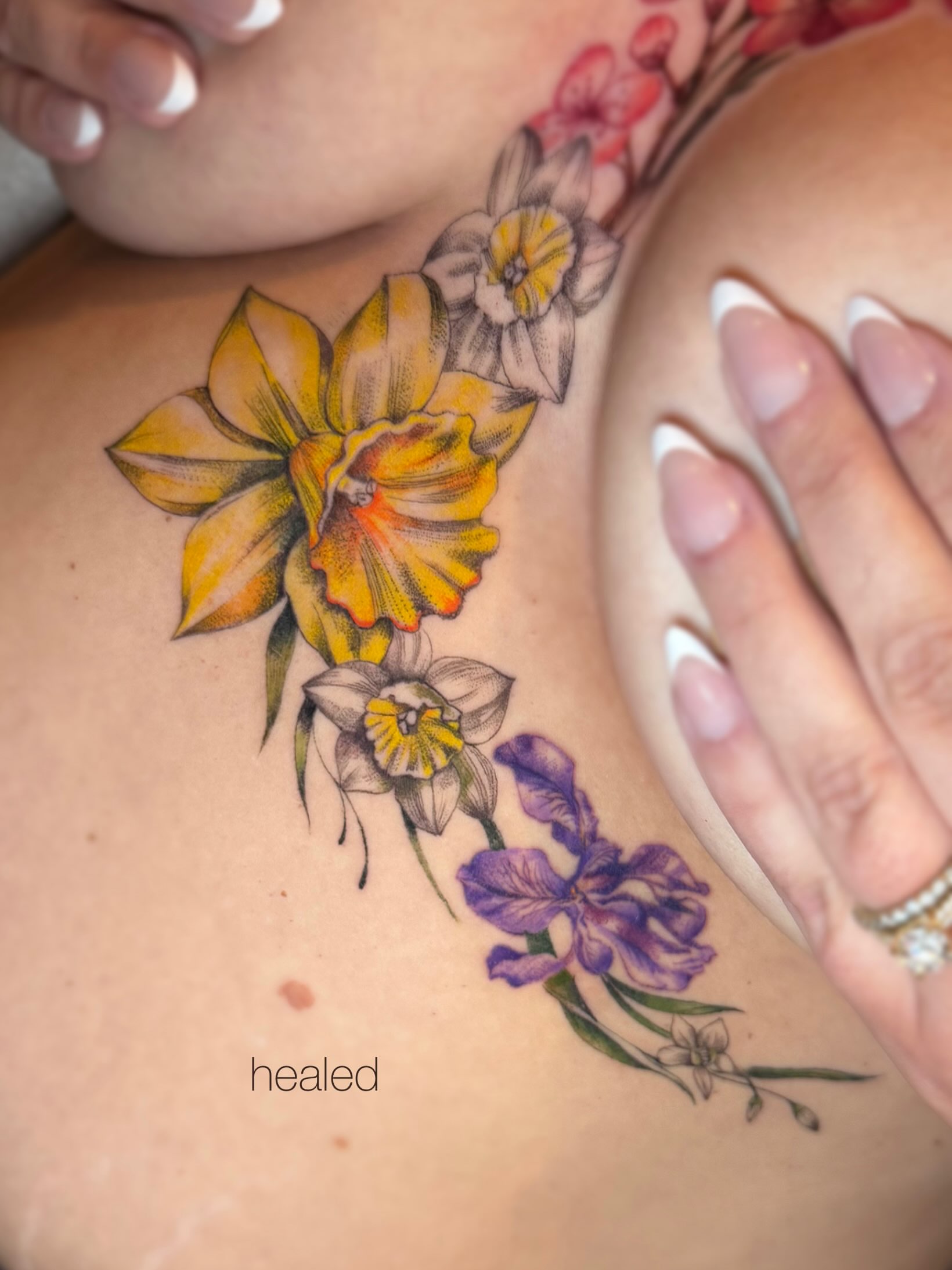 Floral arrangement realism tattoo on the shoulder by Iciez