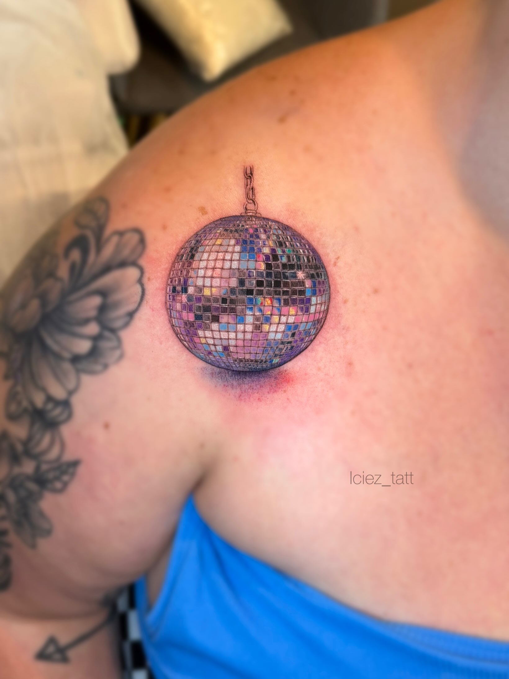 Disco ball realism tattoo on the shoulder by Iciez