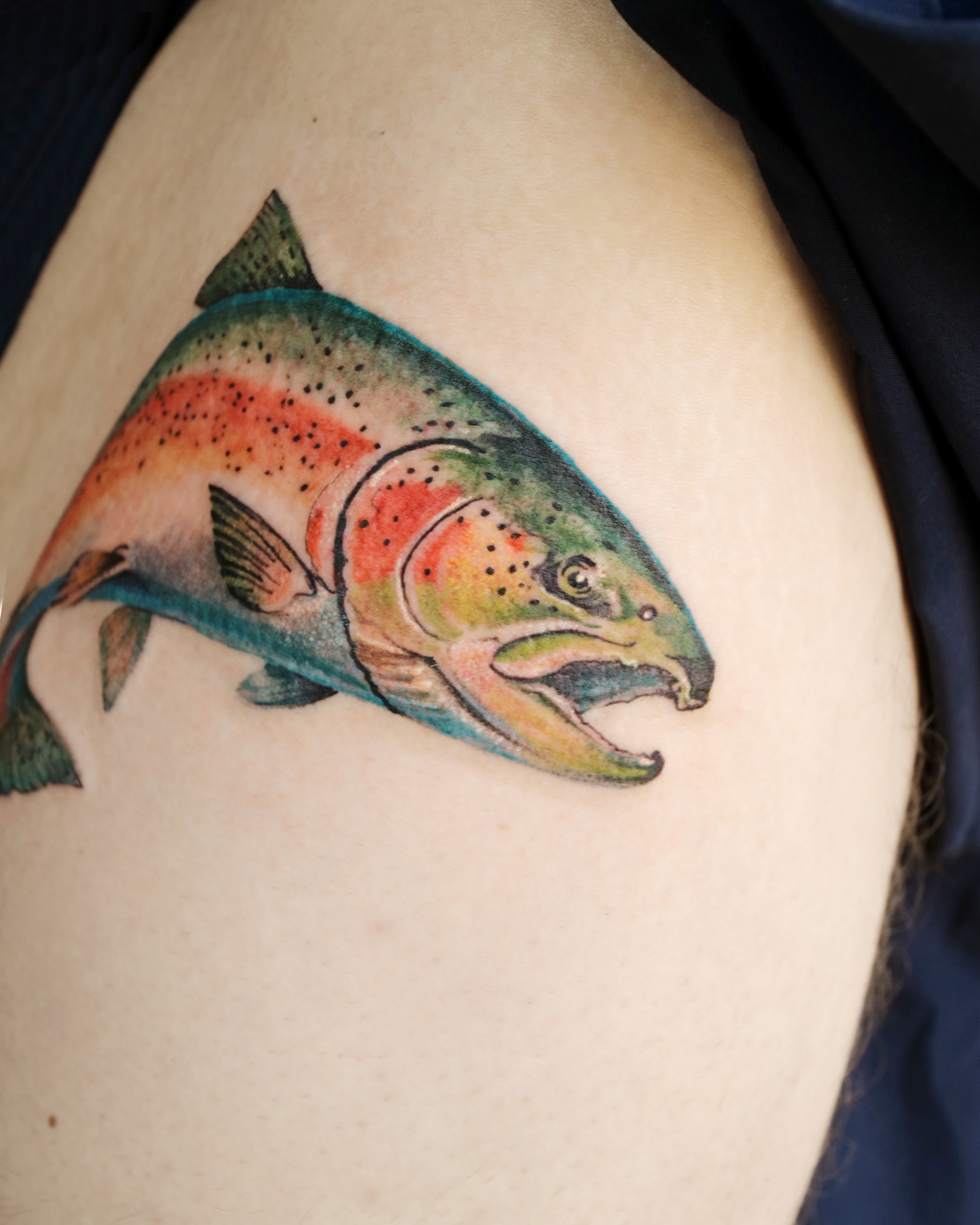 Rainbow trout realism tattoo on the shoulder by Aroha