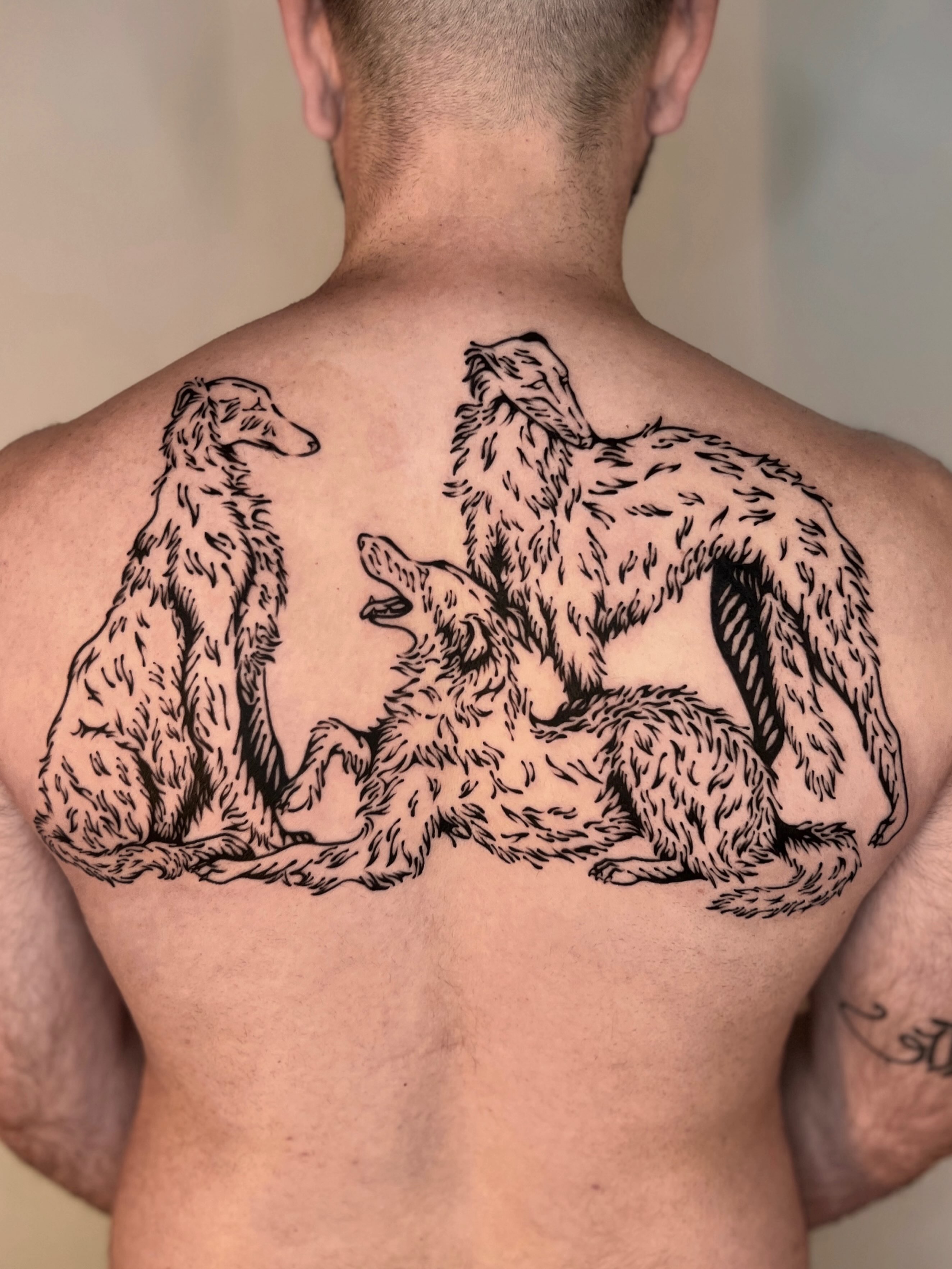 Three wolves black and grey tattoo on the back by Wonny
