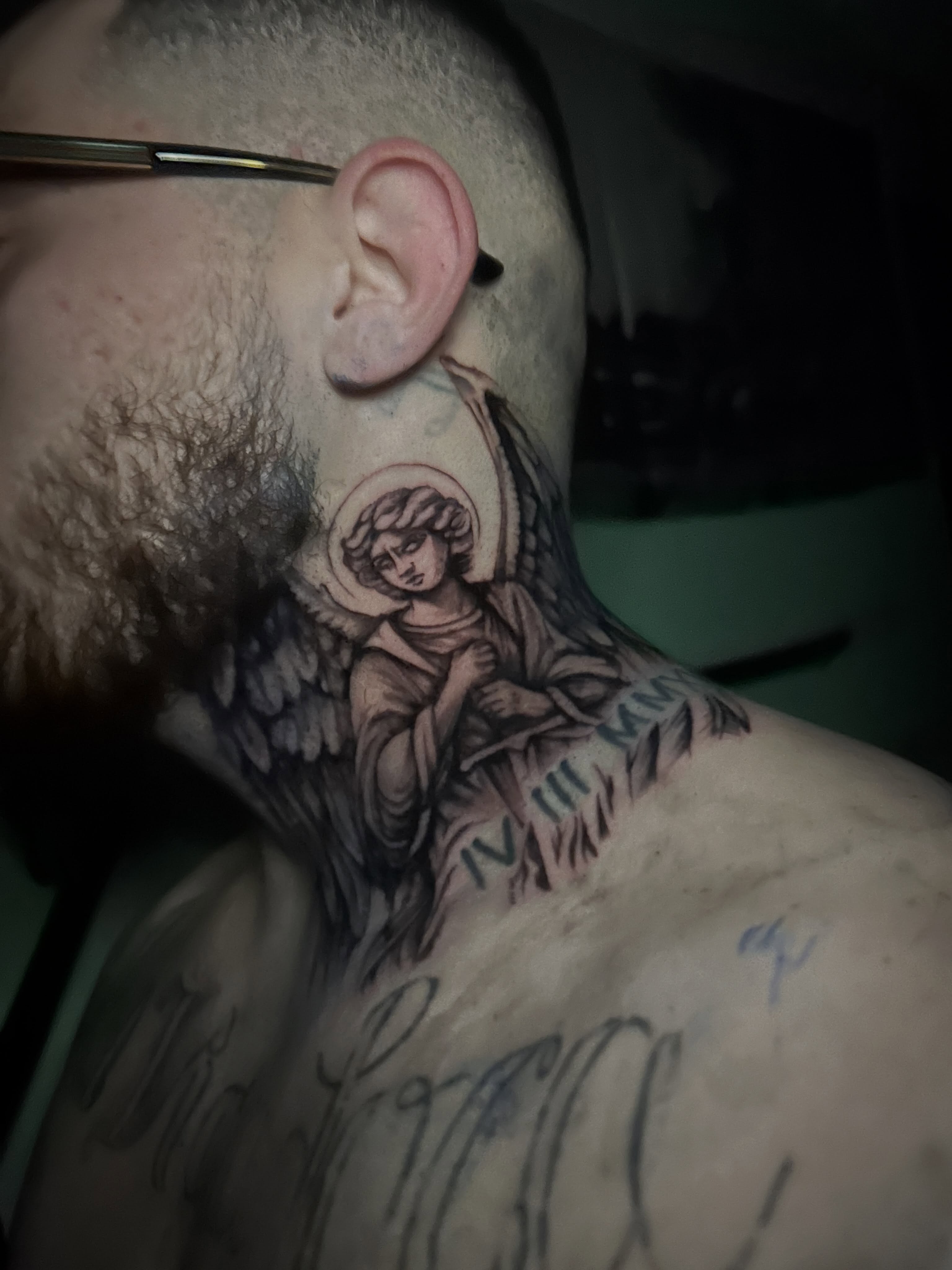 Angel black and grey tattoo on the neck by Marky