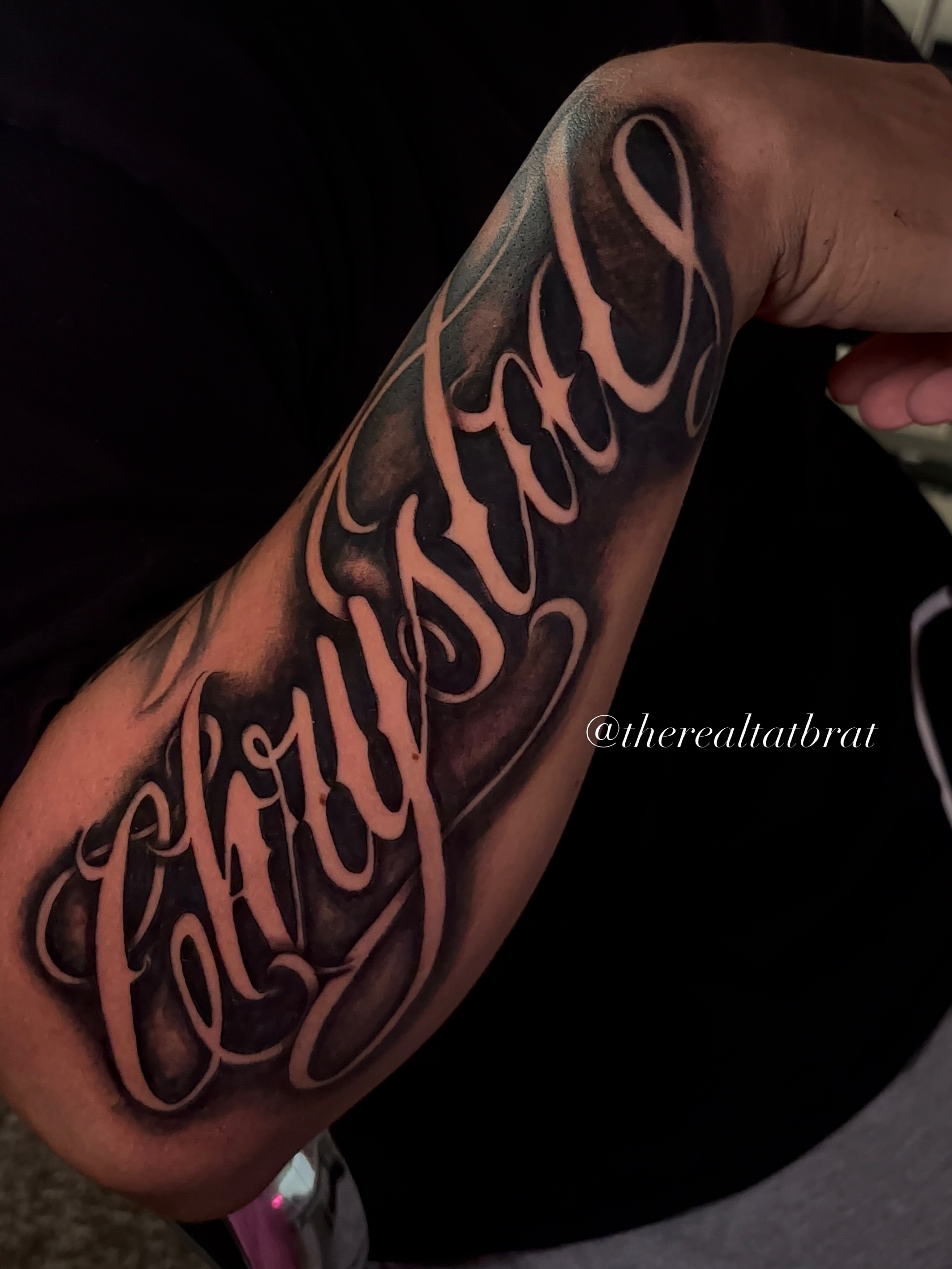 Tattoo by @therealtatbrat — lettering_script