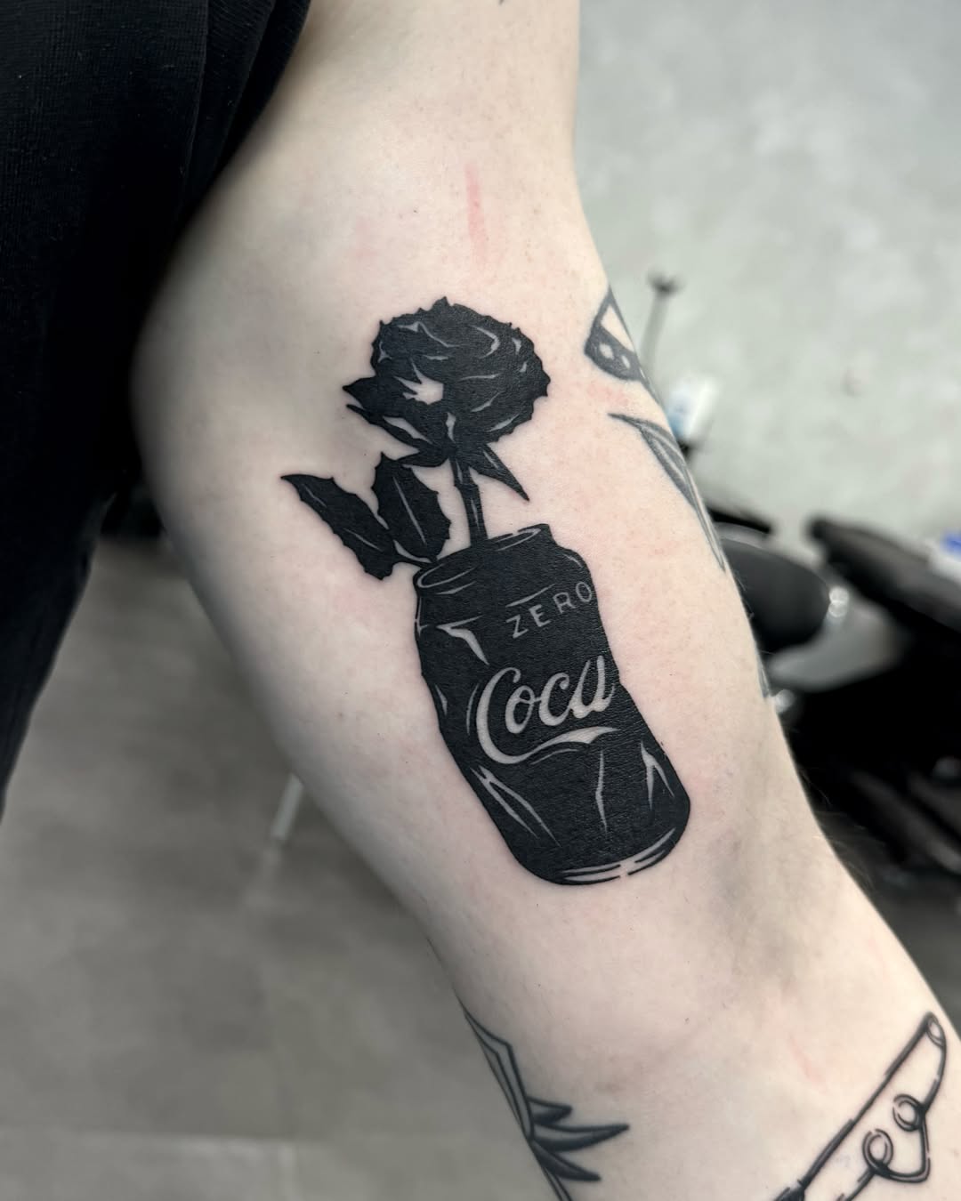 Rose and soda can black and grey tattoo on the forearm by 블랙워크 로니  blackwork roni