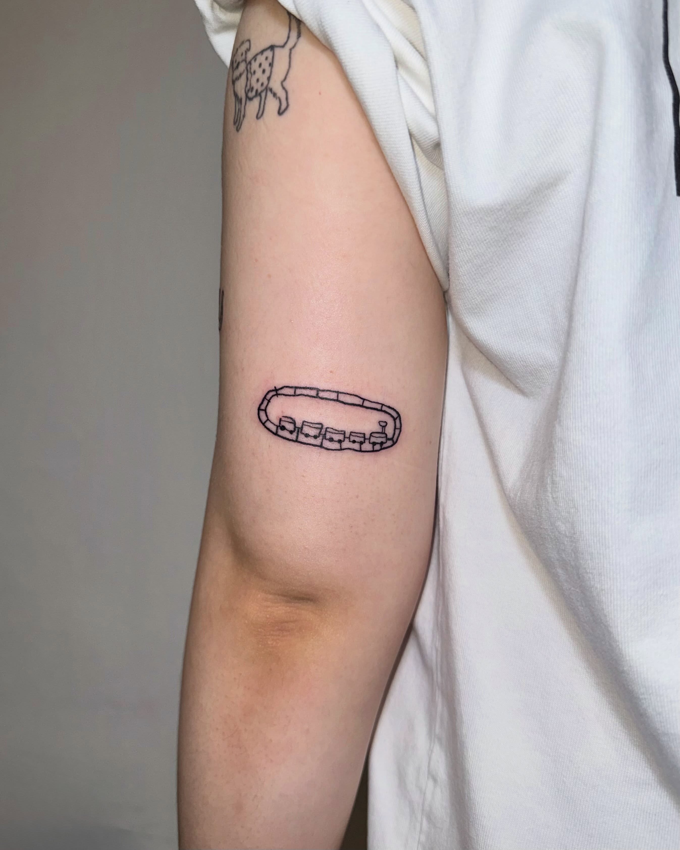 Track geometric tattoo on the forearm by 림구타투