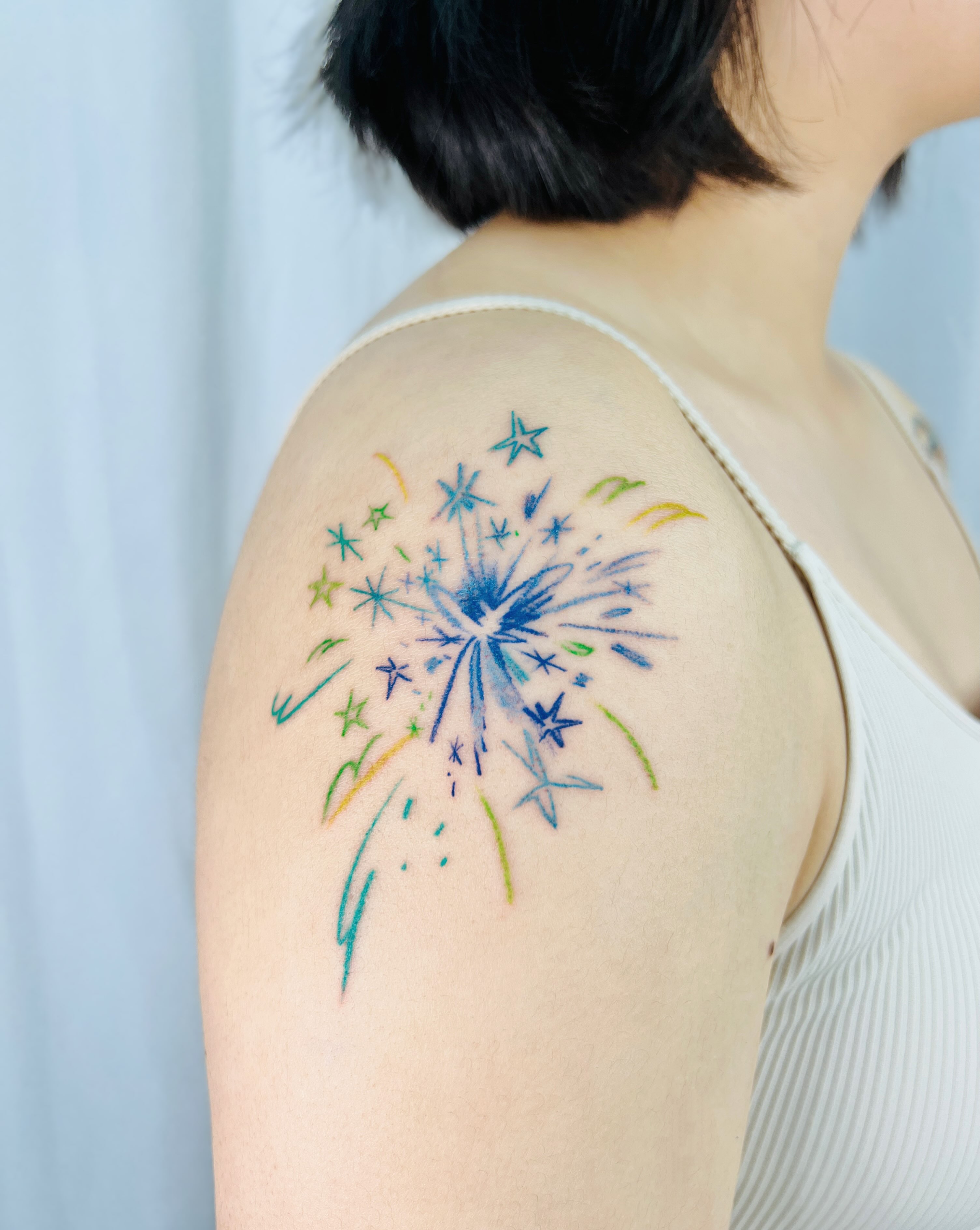 Dandelion seed puff watercolor tattoo on the shoulder by Purinn