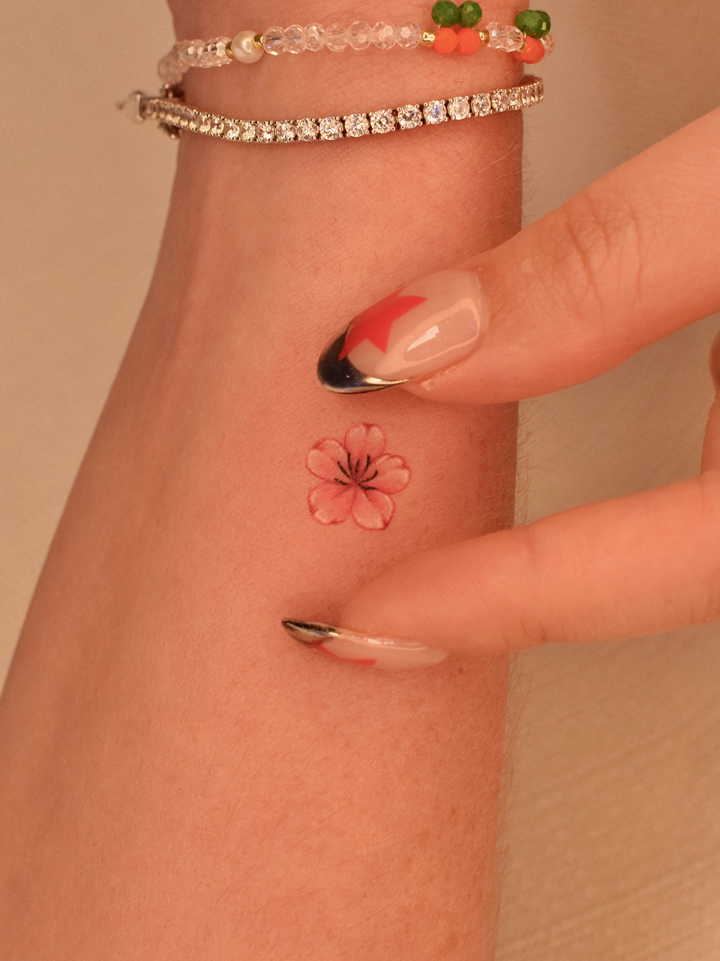 Tattoo by @tattooer_jina — watercolor