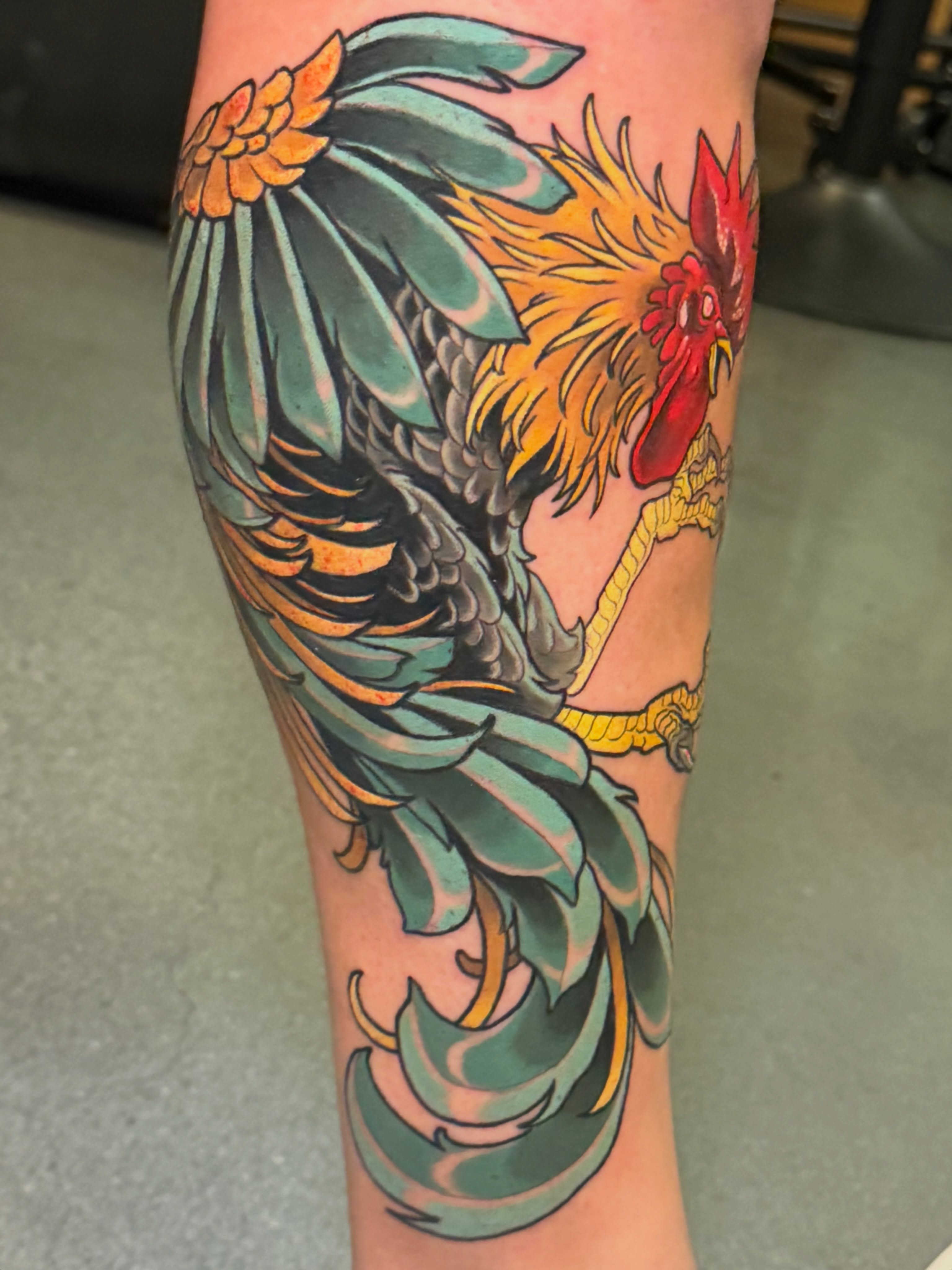 Rooster American traditional tattoo on the forearm by Willy Cutlip