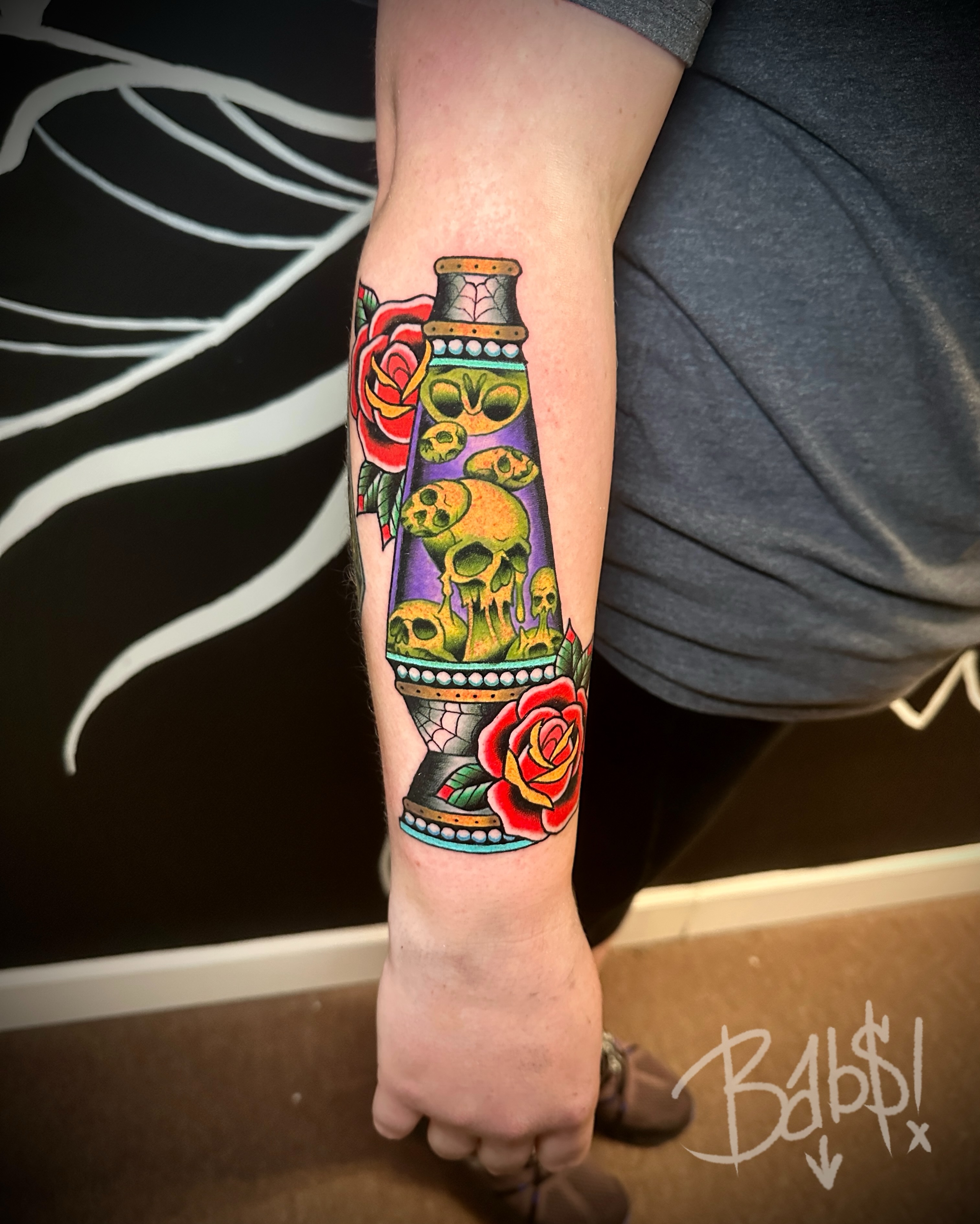 Lava lamp American traditional tattoo on the forearm by Justin B