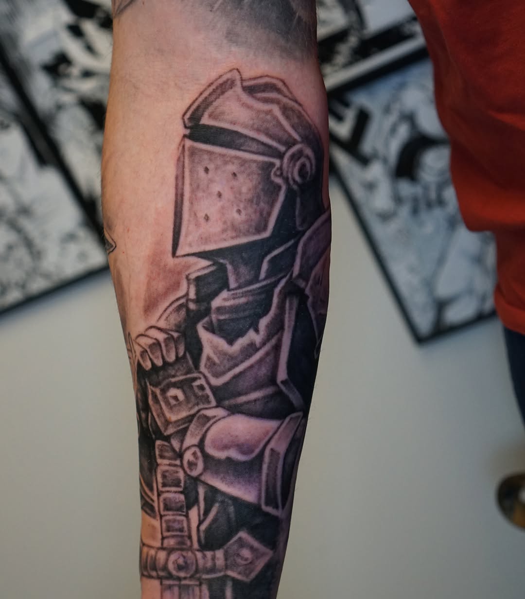 Mecha suit black and grey tattoo on the forearm by Nicholas Capellan, Winter Park, Florida