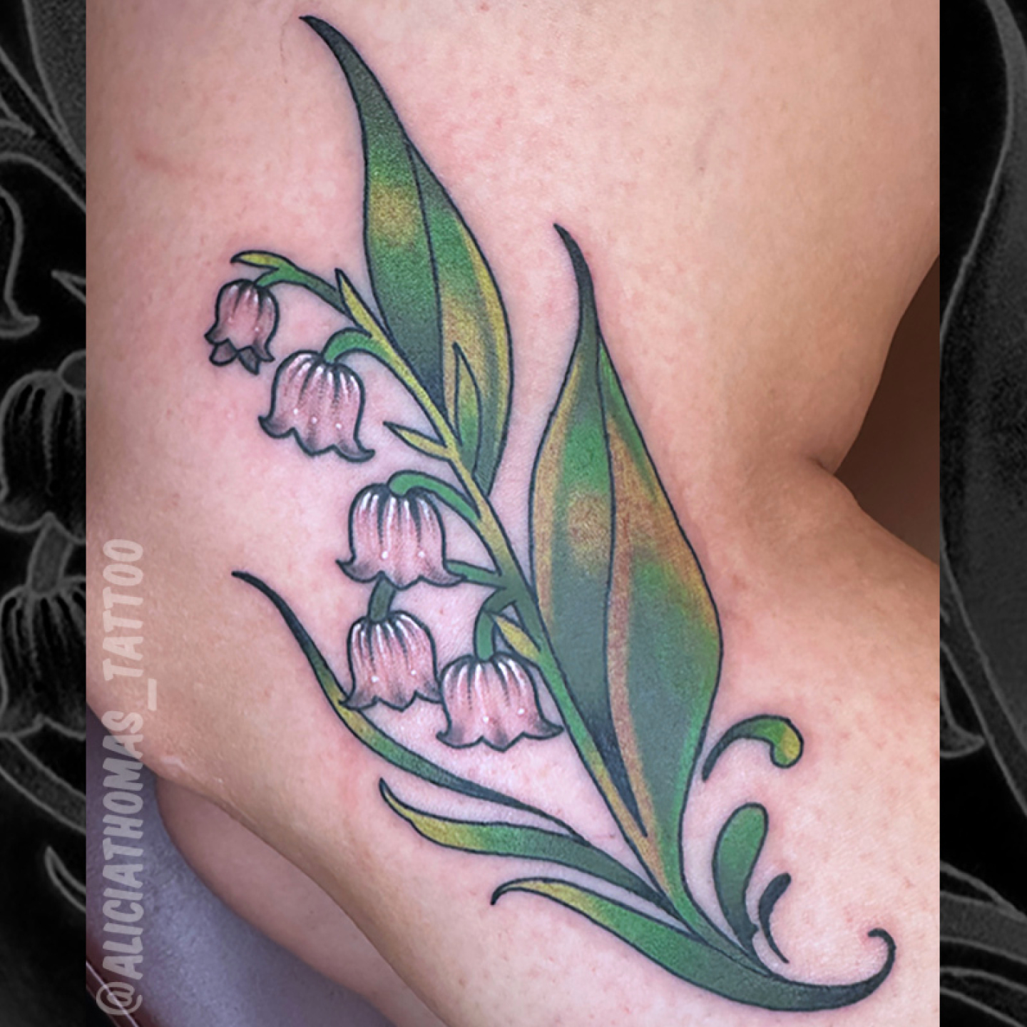 Lily of the valley realism tattoo on the upper arm by 𝖆𝖑𝖎𝖈𝖎𝖆 𝖙𝖍𝖔𝖒𝖆𝖘
