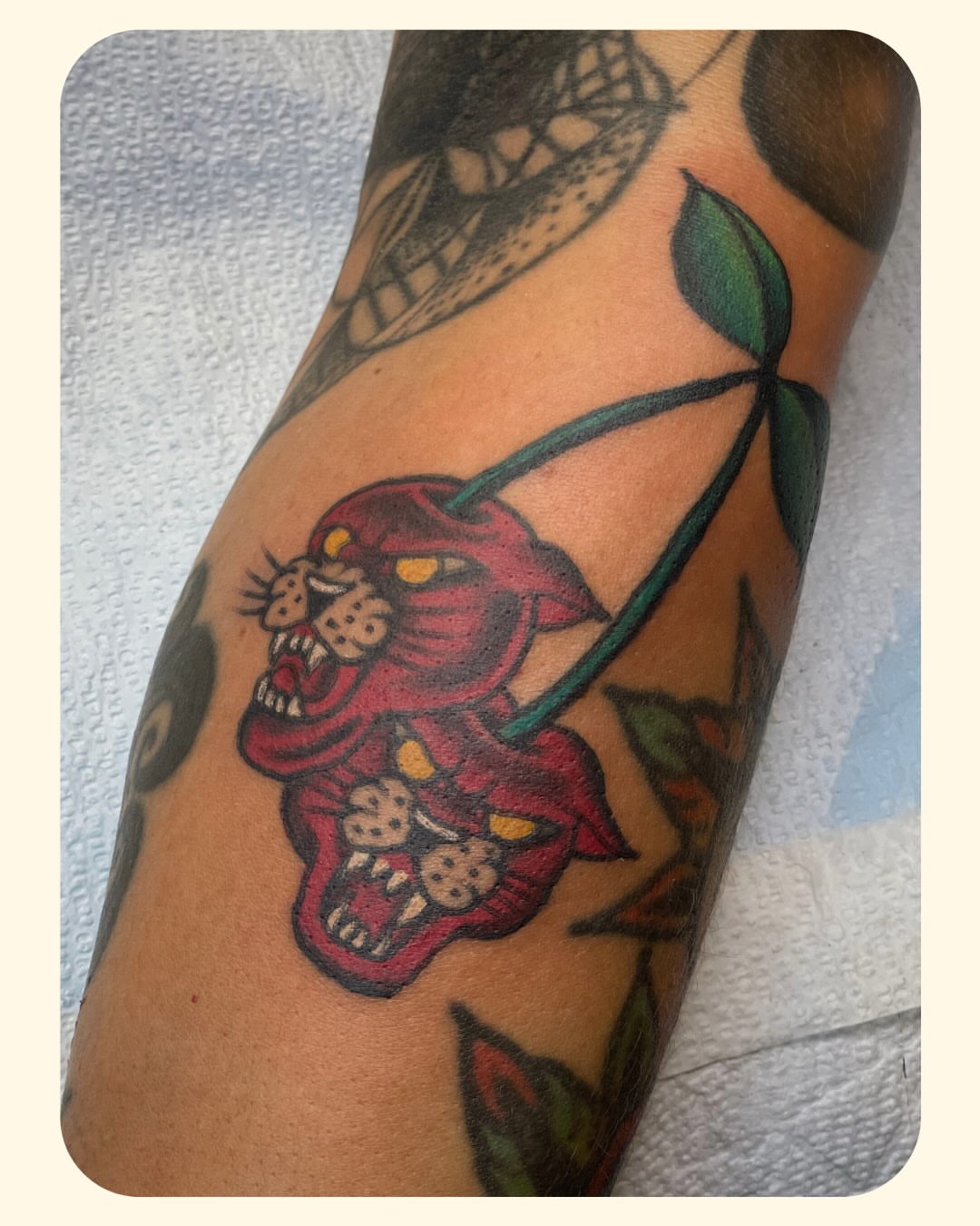 Panther and flower American traditional tattoo on the forearm by 𝐒𝐚𝐦𝐬𝐨𝐧𝐋𝐚𝐳𝐚𝐫𝐭𝐞