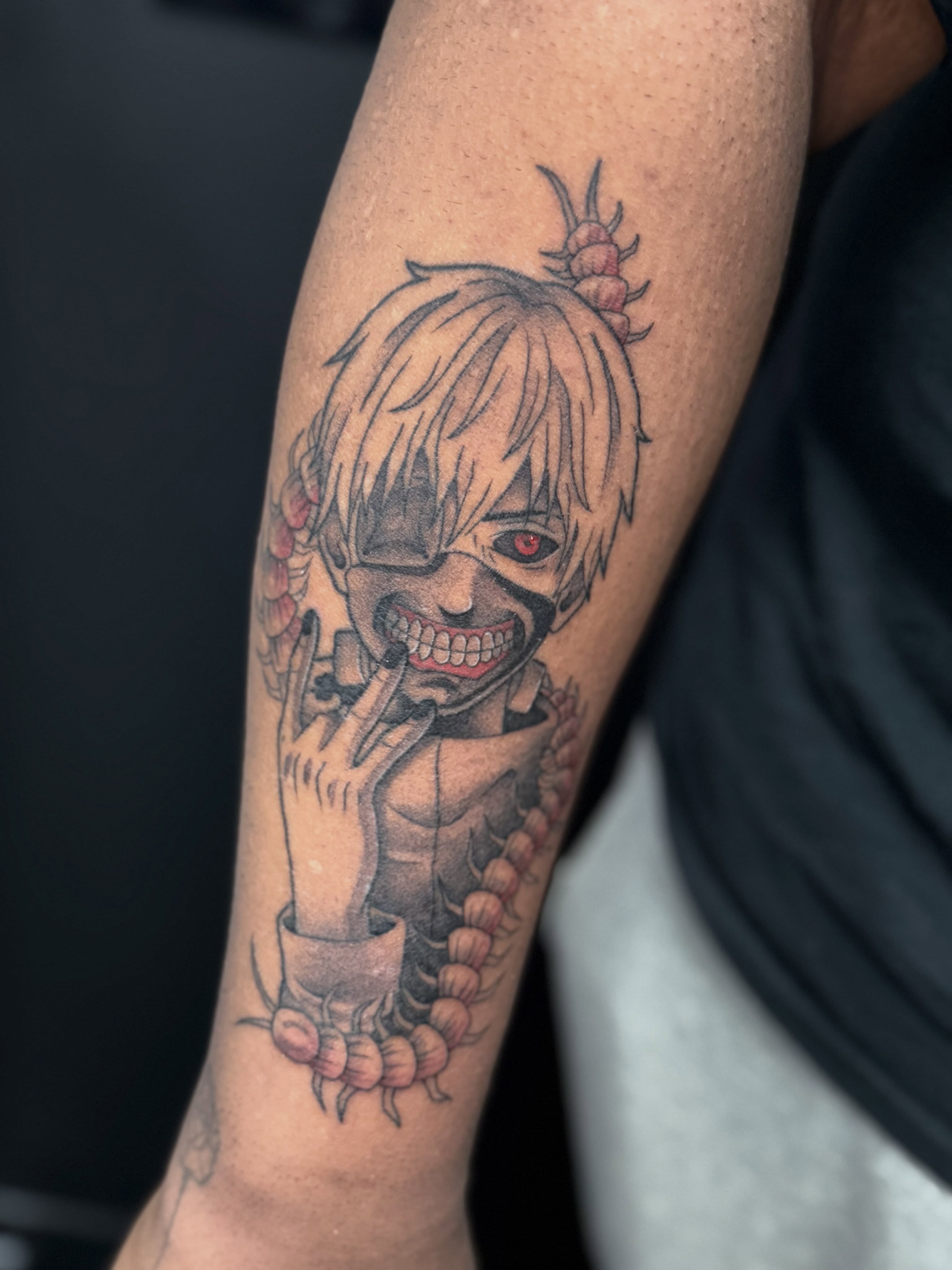 Anime character anime tattoo on the forearm by Felicity