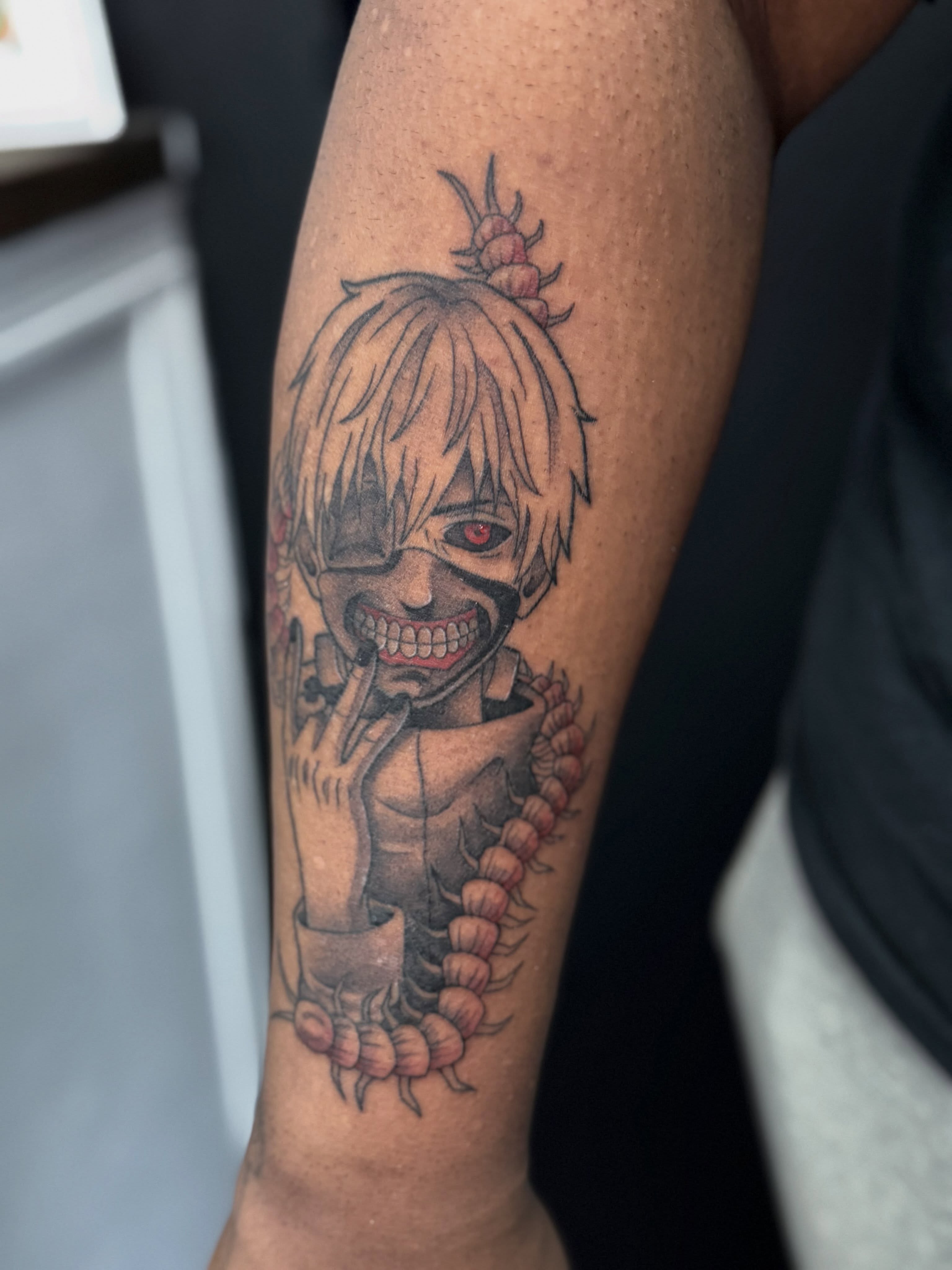 Anime character anime tattoo on the forearm by Felicity