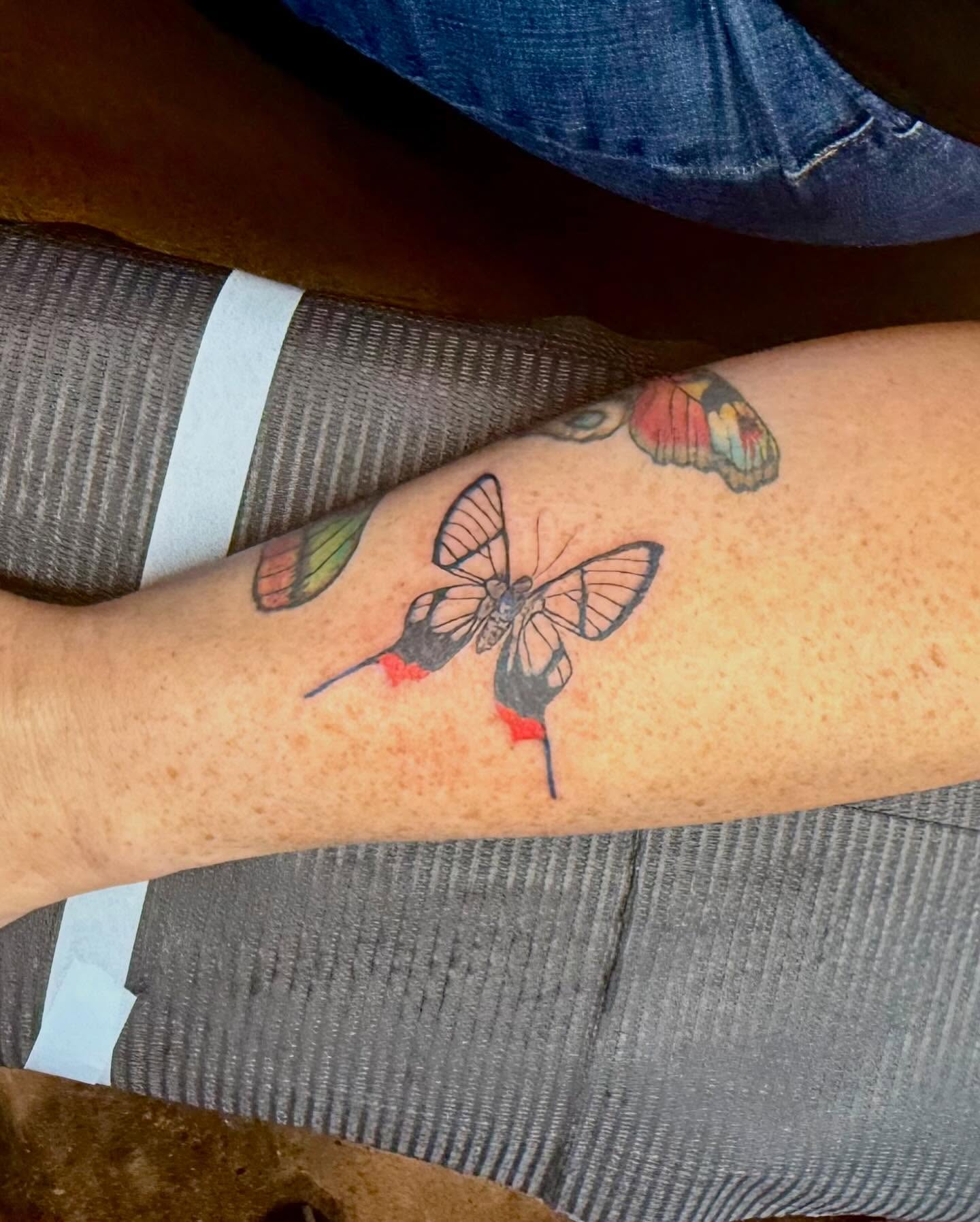 Butterfly new school tattoo on the forearm by Nina Rush