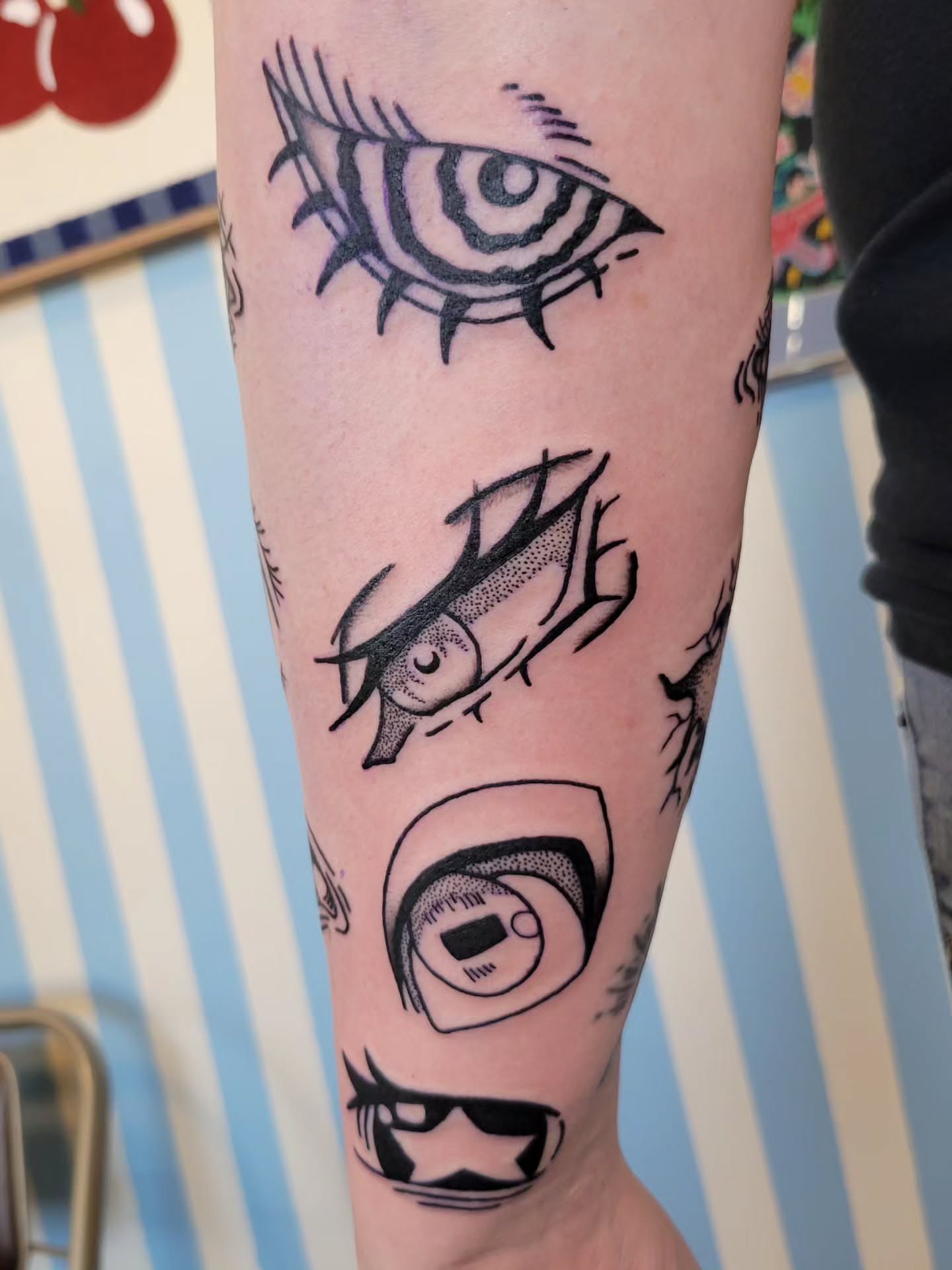 Eyes dotwork tattoo on the forearm by Cat Wong意藝