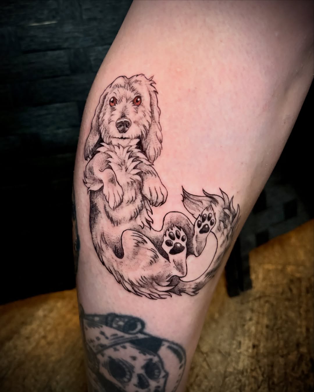 Dog black and grey tattoo on the thigh by Abby Ruok, Midvale, Utah