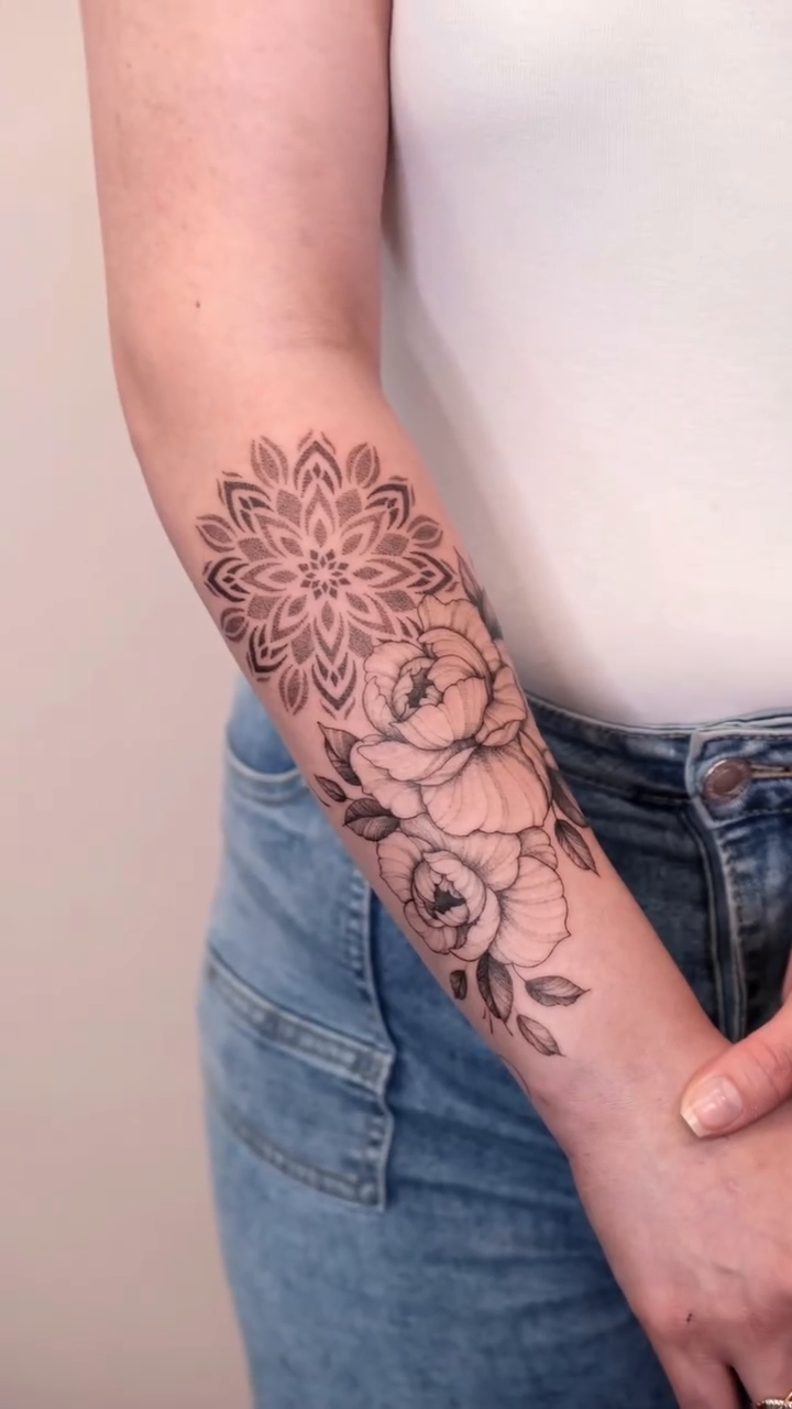 Mandala and peonies dotwork tattoo on the forearm by Your tattoo Artist, New York, New York