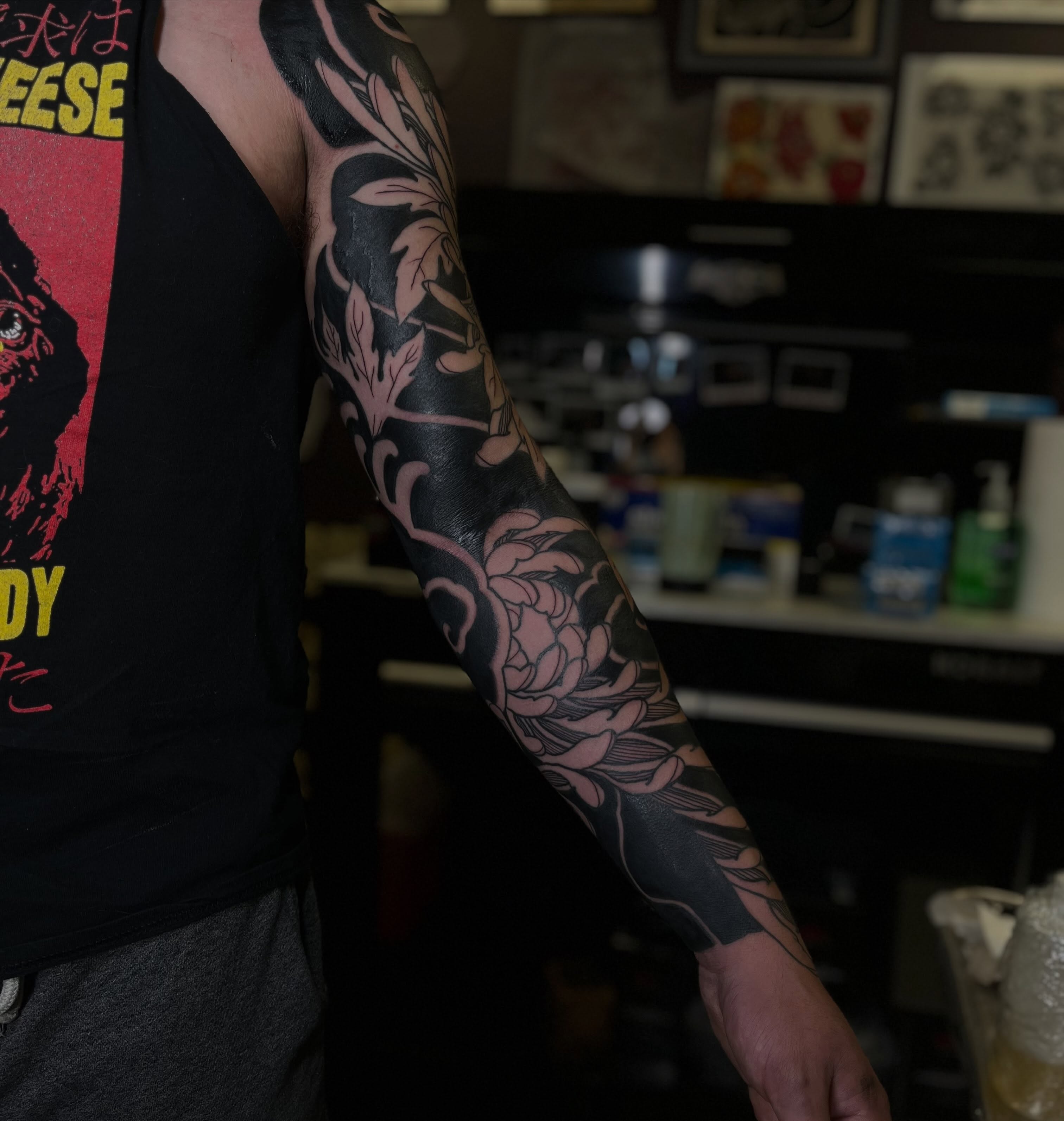 Floral design japanese irezumi tattoo on the upper arm by Kaichi Fujita, Eugene, Oregon