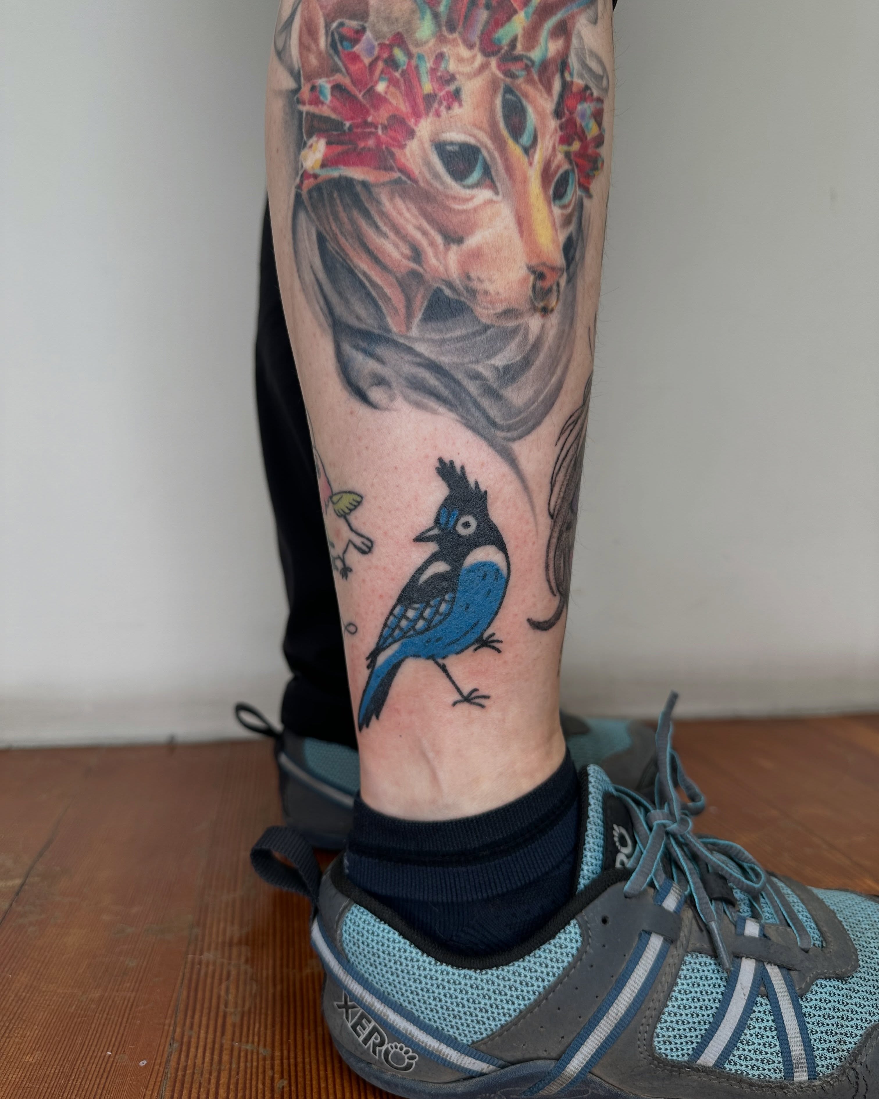 Deer and bird realism tattoo on the calf by paulina