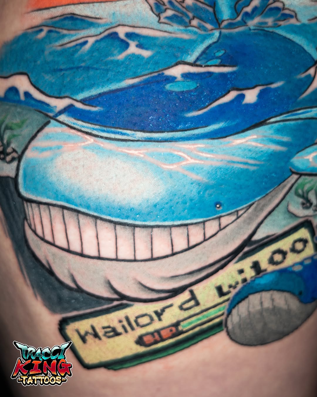 Whale American traditional tattoo on the torso by Tracci King